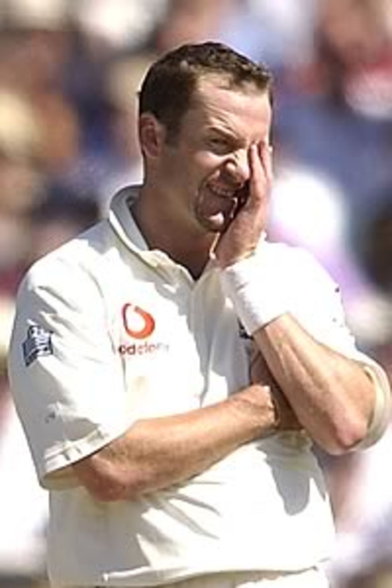 MELBOURNE - DECEMBER 26: Craig White of England looks on dejected as the ball goes to the boundry during the first day of the Boxing Day Fourth Ashes Test between Australia and England, played at the Melbourne Cricket Ground in Melbourne, Australia on December 26, 2002.