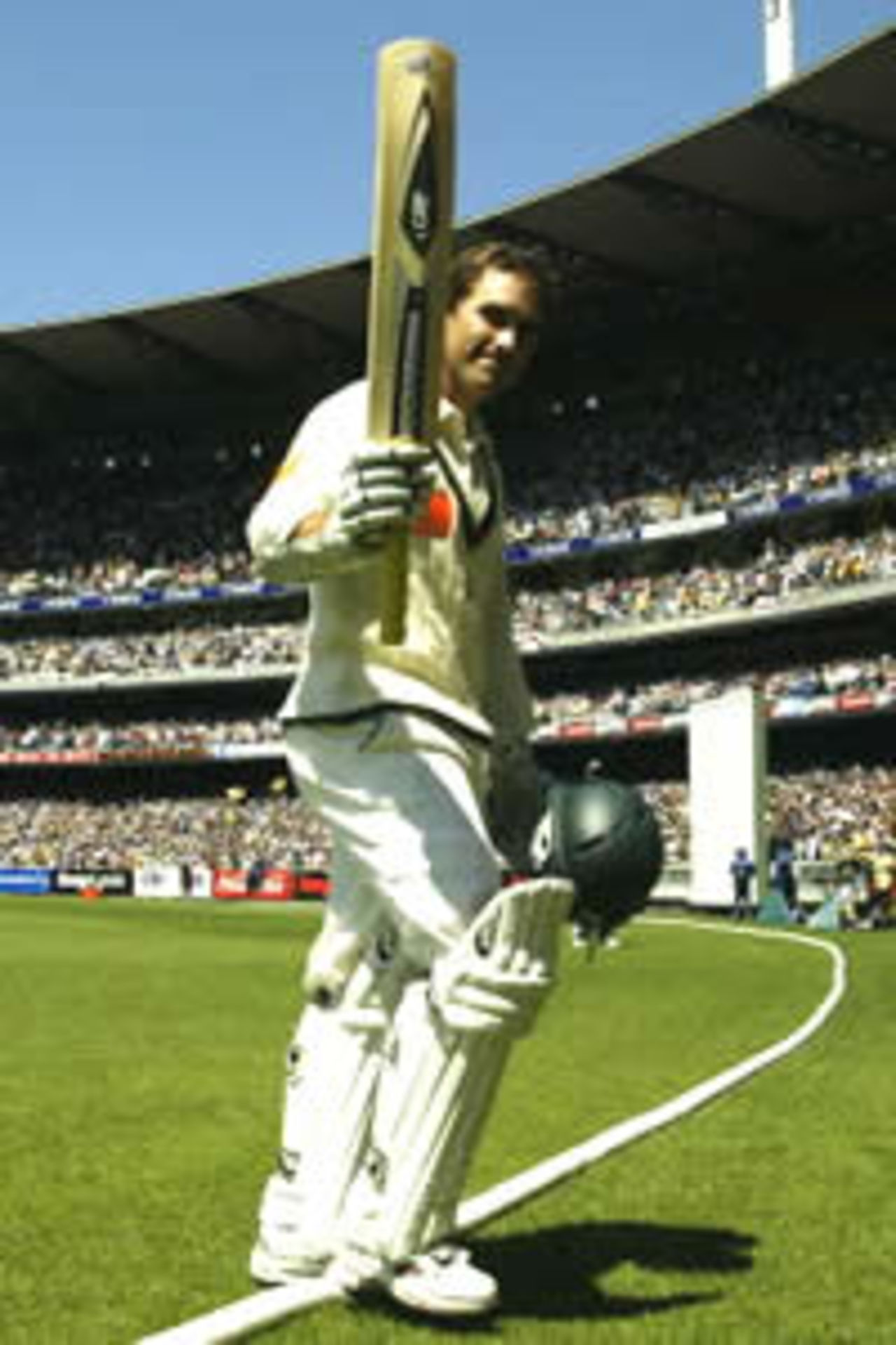 MELBOURNE - DECEMBER 27: Justin Langer of Australia leaves the field after making 250 runs during the second day of the Fourth Ashes Test between Australia and England at the Melbourne Cricket Ground in Melbourne, Australia on December 27, 2002.
