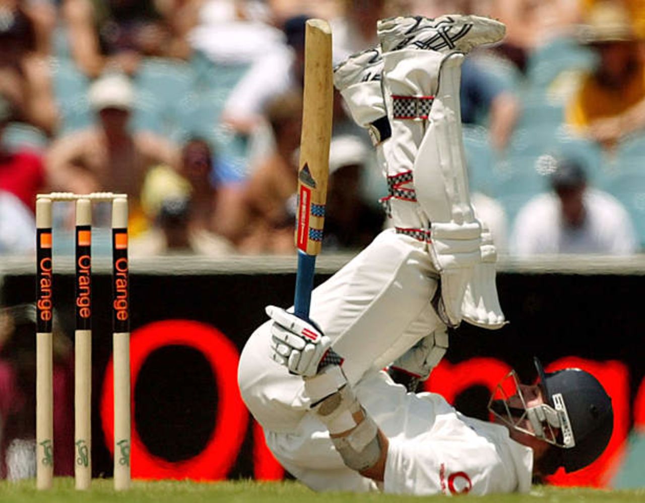 England's James Foster lies on his back to avoid a Jason Gillespie bouncer during day three of the fourth Ashes Test at Melbourne, Sat 28 Dec 2002