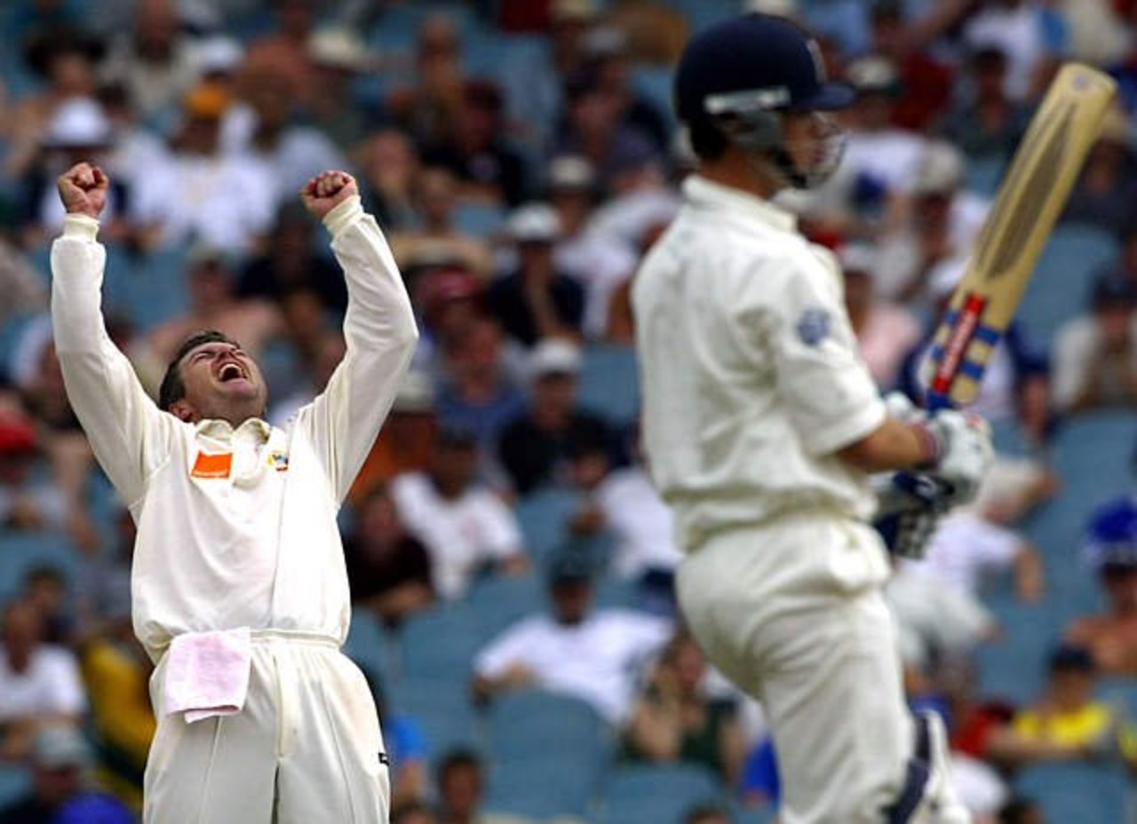 Australia's Stuart MacGill celebrates the wicket of James Foster, one in his five wicket haul during England's second innings on the fourth day of the Melbourne Test, Sun 29 Dec 2002