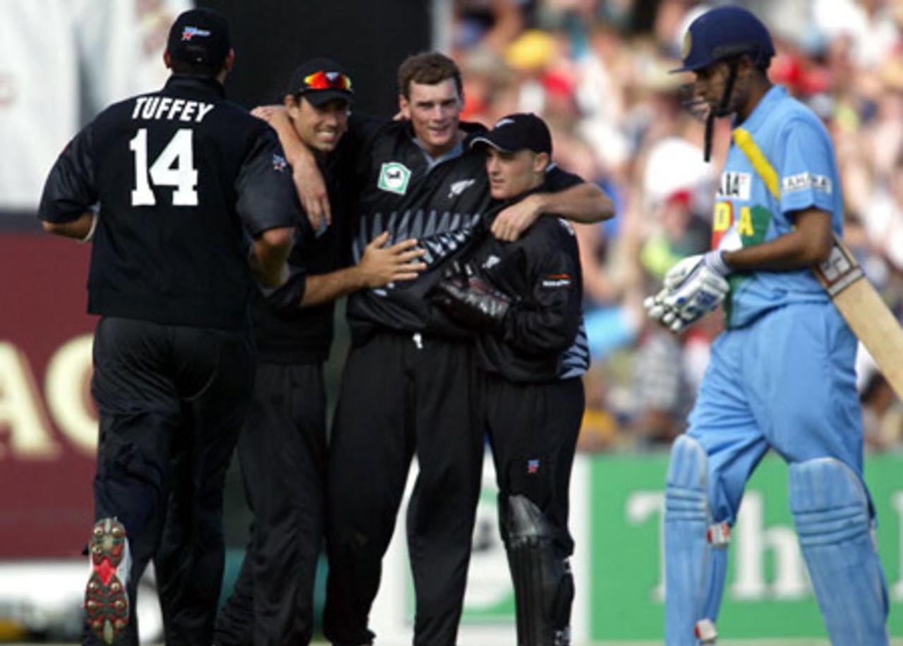 Members of the New Zealand team celebrate the dismissal of Indian batsman VVS Laxman, caught by wicket-keeper Brendon McCullum off the bowling of Kyle Mills for 20. From left: Daryl Tuffey, Stephen Fleming, Mills, McCullum and Laxman. 2nd ODI: New Zealand v India at McLean Park, Napier, 29 December 2002.