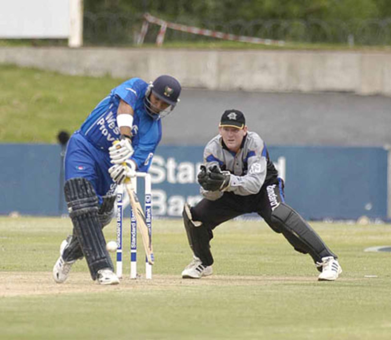 Ashwell Prince plays to leg with Boland wicketkeeper Steve Palframan looking on