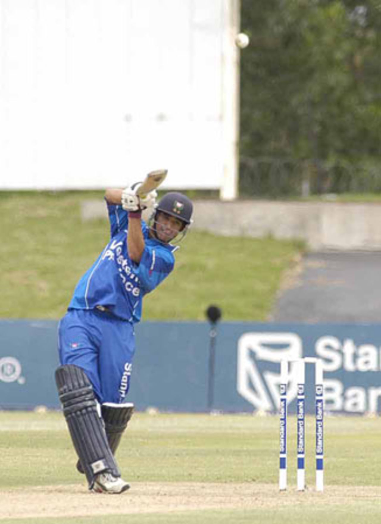 JP Duminy moves  to leg and hits a six in his innings of 69 against Boland