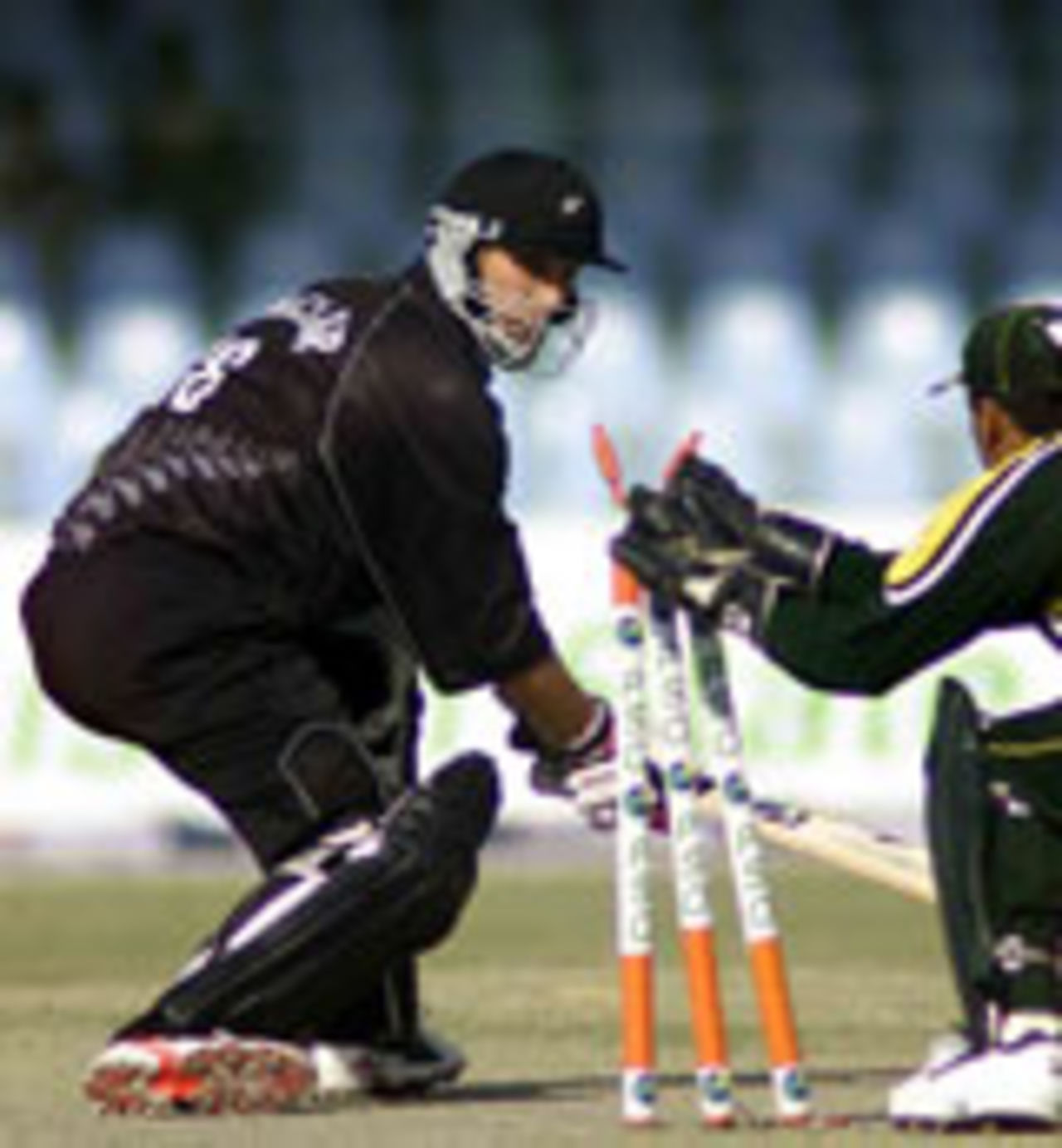 Mathew Sinclair stumped by Moin Khan, Pakistan v New Zealand, 1st ODI, Lahore, November 29, 2003.