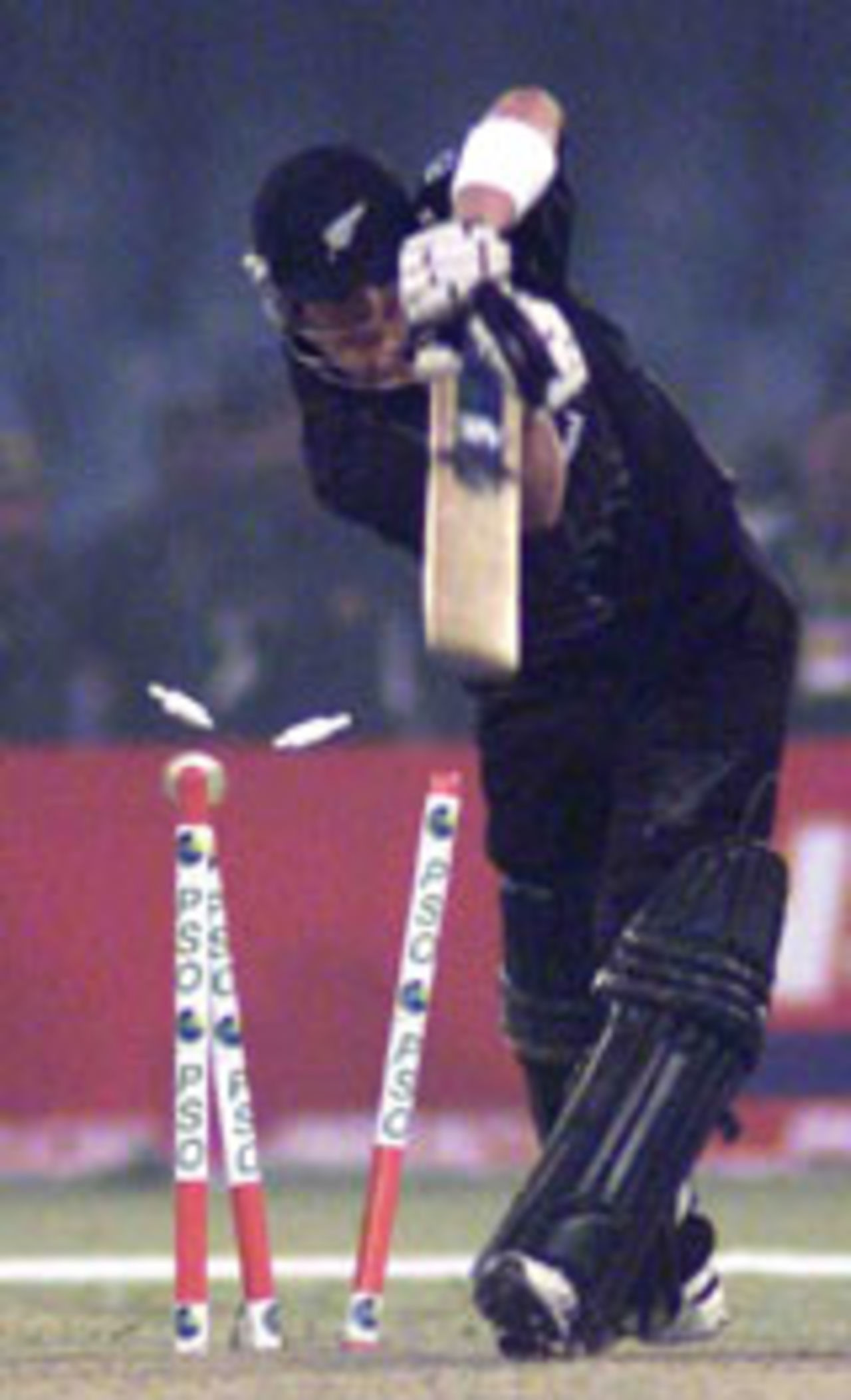 Paul Hitchcock bowled by Mohammad Sami during his 5 for 10 spell, Pakistan v New Zealand, 2nd ODI, Lahore, December 1, 2003.