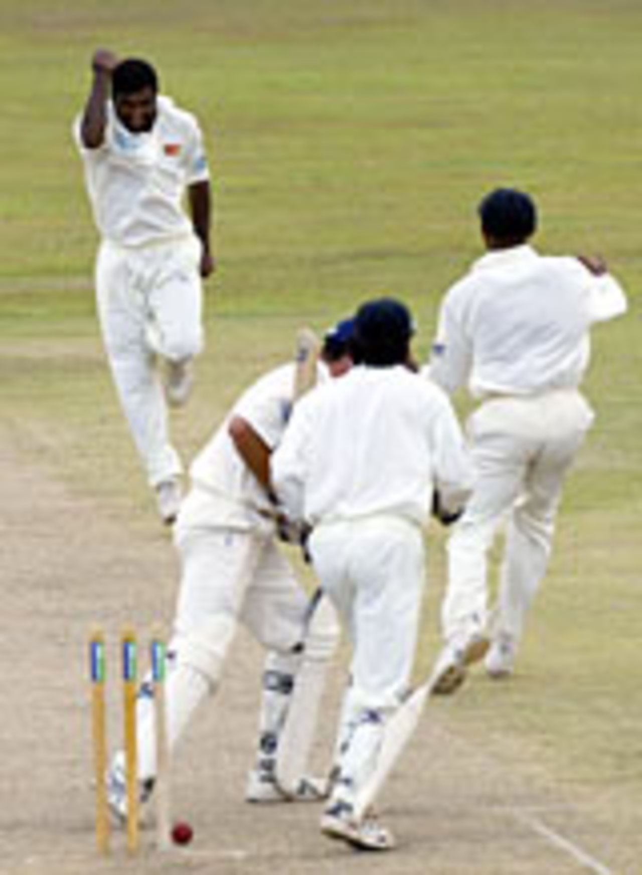 Michael Vaughan is bowled shouldering arms to Muttiah Muralitharan, Sri Lanka v England, 1st Test, Galle, December 3, 2003