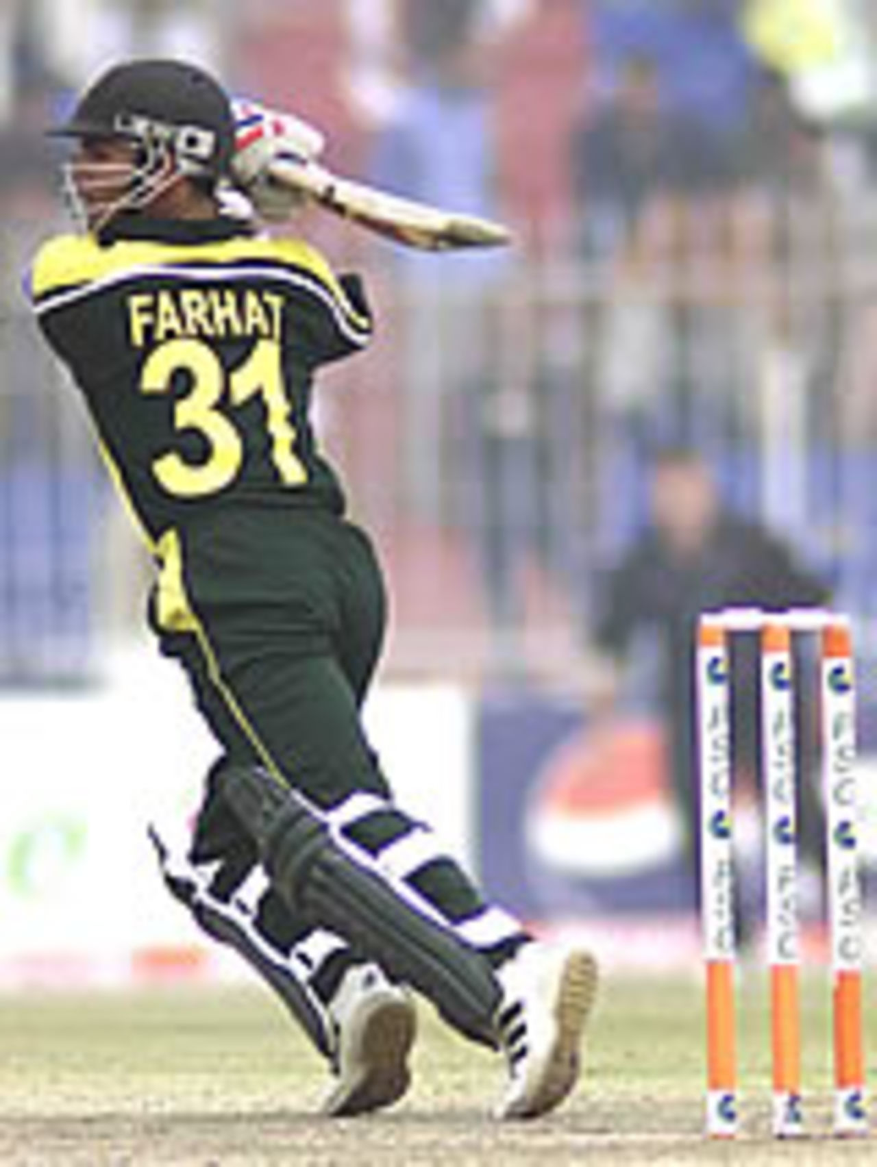 Imran Farhat lashes out during his 91, Pakistan v New Zealand, 3rd ODI, Faisalabad, December 3, 2003.