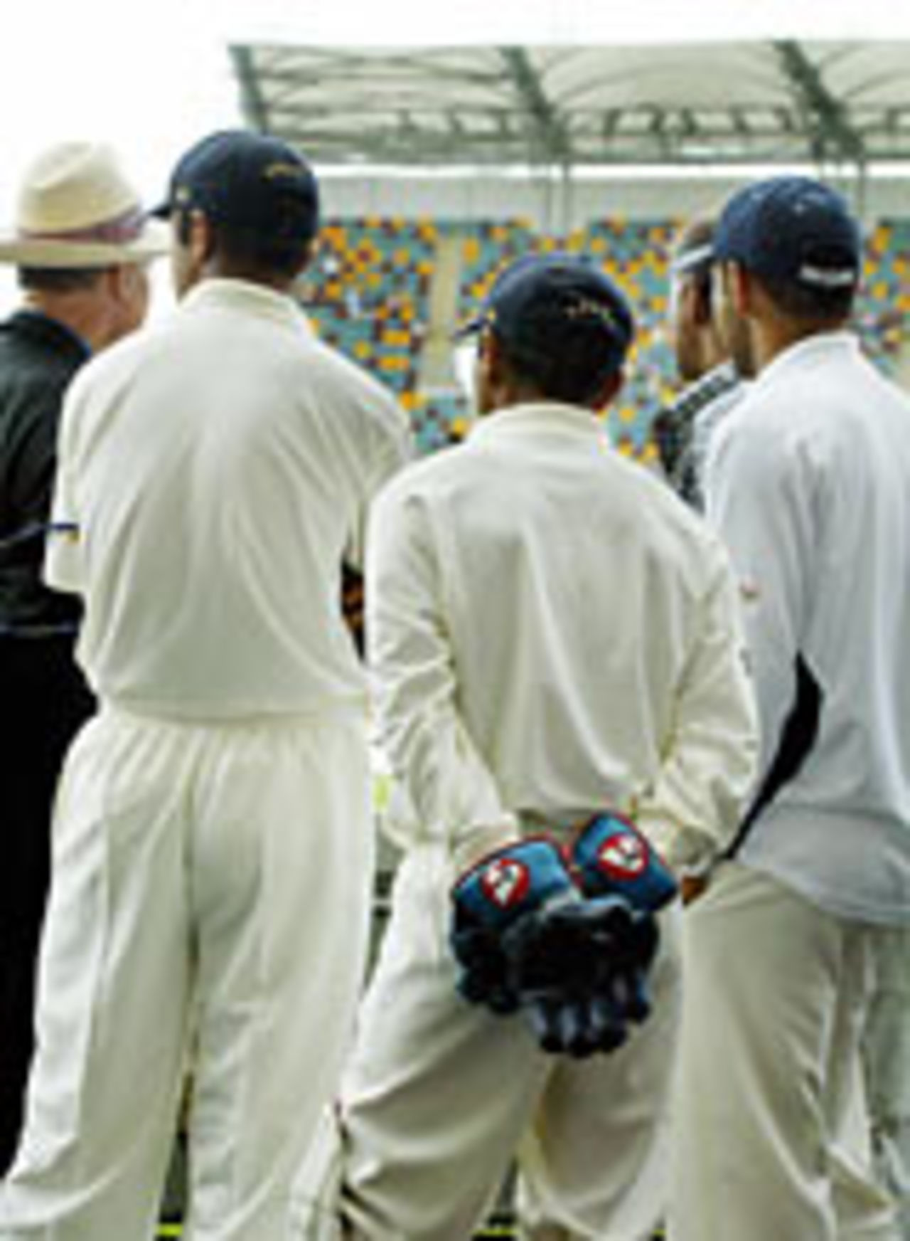Indian players wait for the rain to stop, Australia v India, 1st Test, Brisbane, December 6, 2003