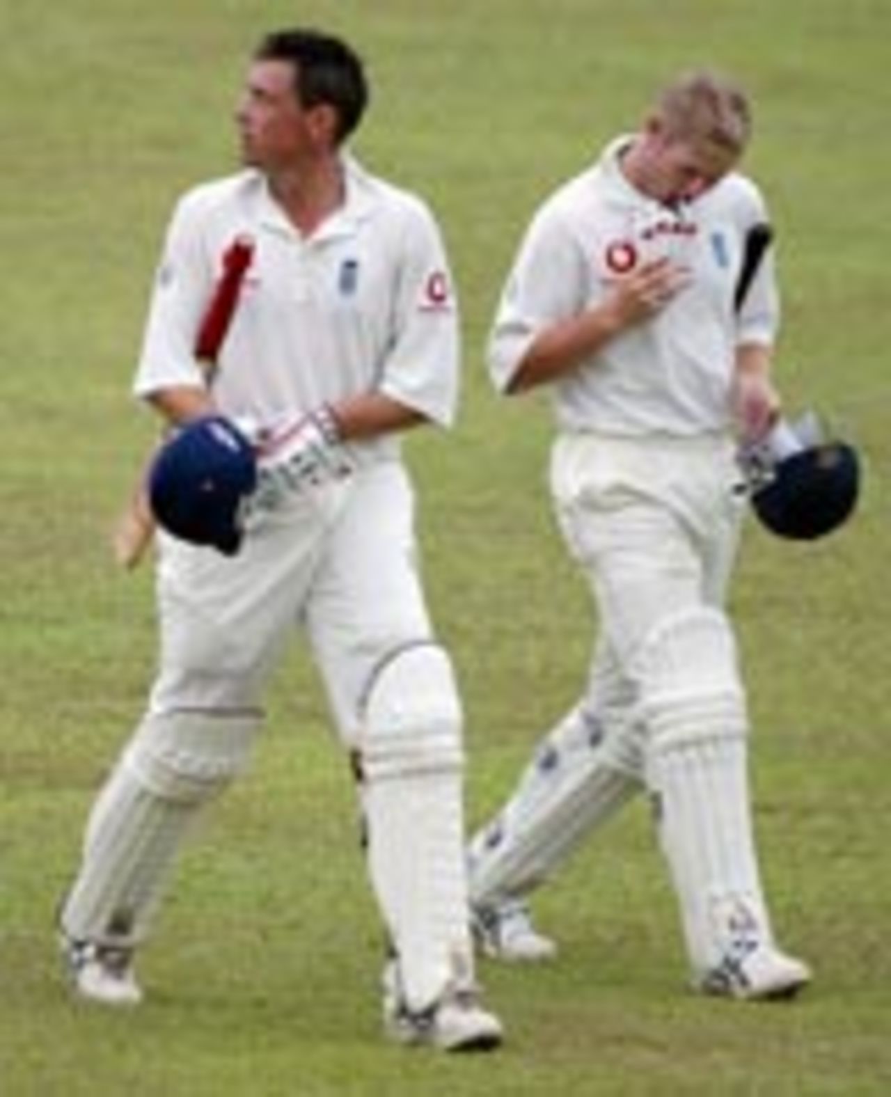 Job done! Giles and Hoggard leave the field with the draw after the Galle Test