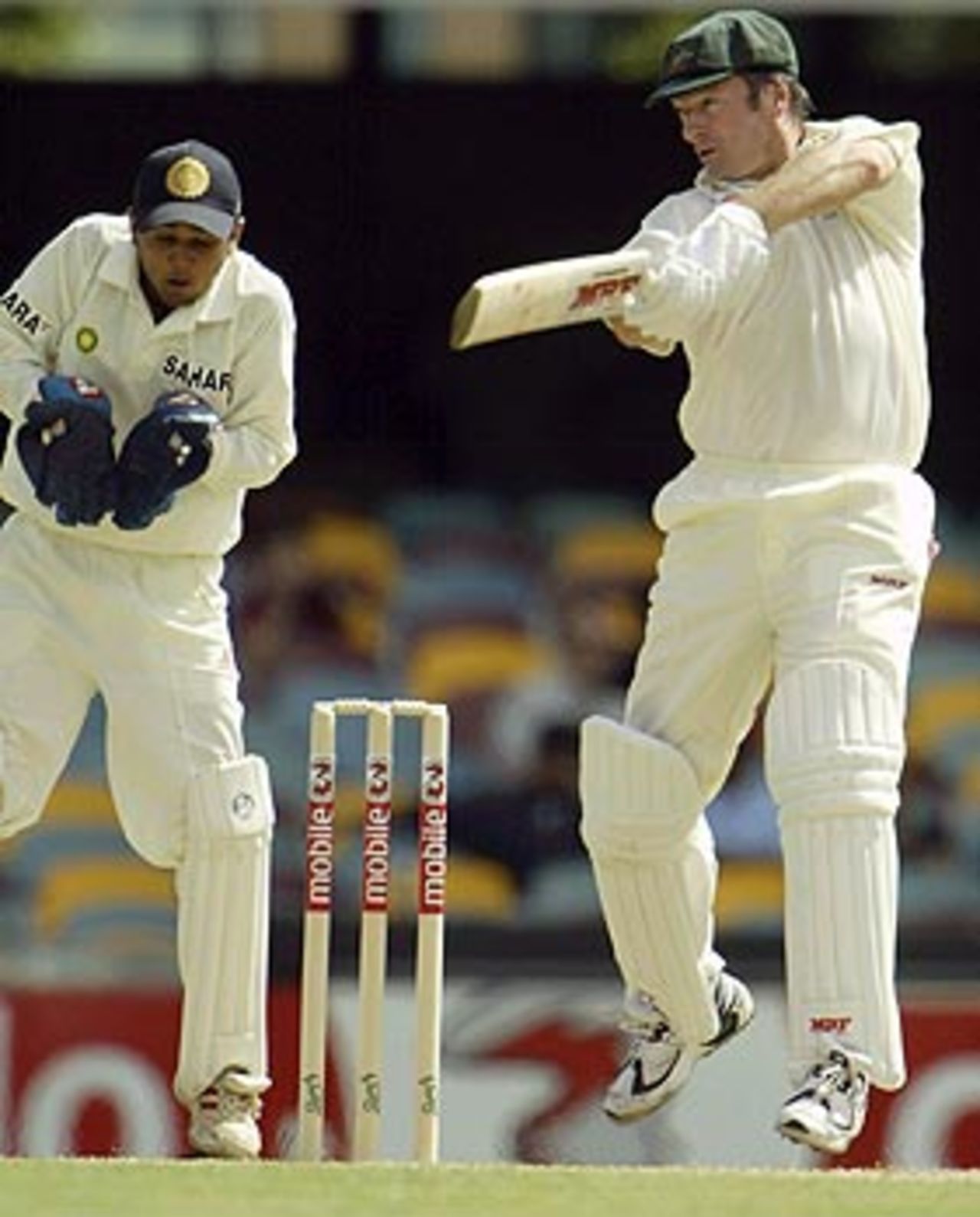 Steve Waugh (debut: 1985) shows Parthiv Patel (born: 1985) a trick of his trade, Australia v India, 1st Test, Brisbane, 5th day, December 8, 2003