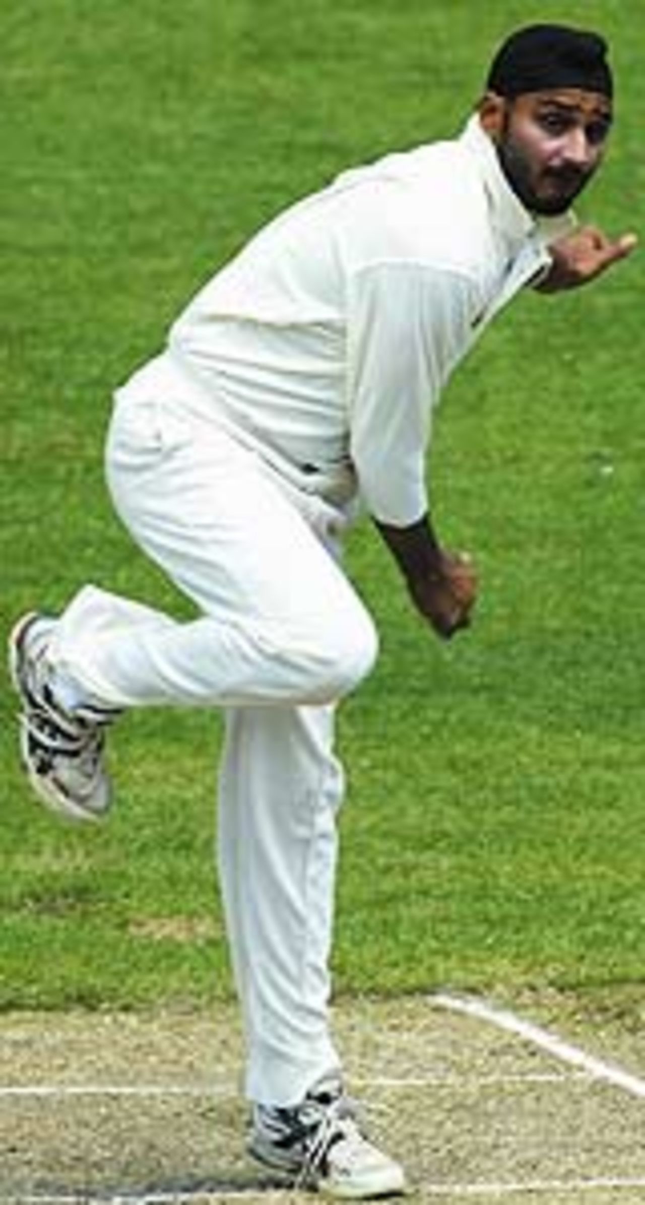 Harbhajan Singh of India in action during day two of the tour match between Victoria and India played at the Melbourne Cricket Ground on November 26, 2003 in Melbourne, Australia.