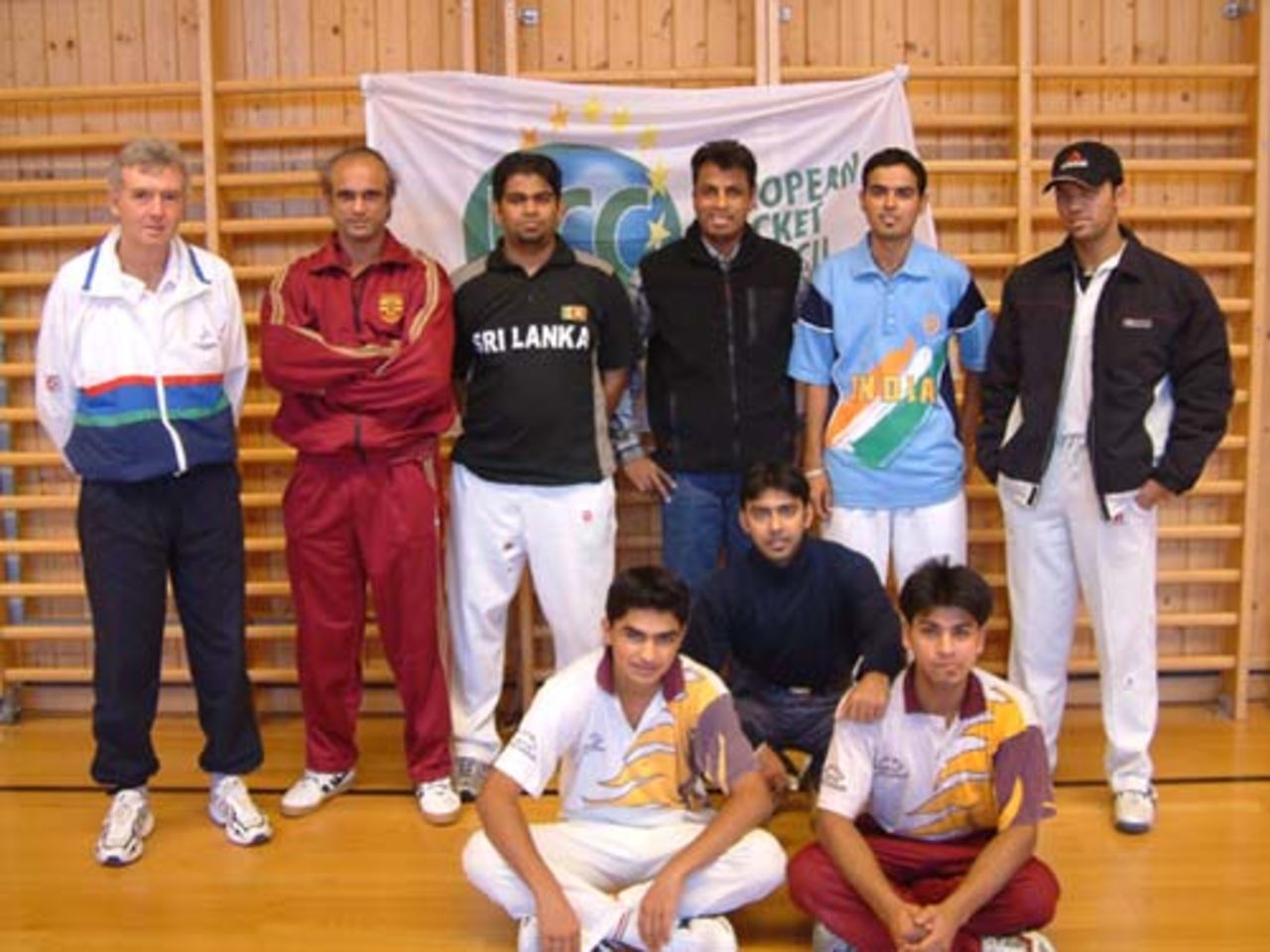 Standing (L to R): Dave Gelling (ECC RCPI Coach), Chisantha Wijesekera (SLCC), Anuranga Munaweera (SLCC), Parmjit Singh (FCCC), Sukhvir Hira (LCC), Amir Naeem (PCC); Sitting: Kamran Naeem (CCC), Wasif Mohammed (LCC), Qasim Tarrer (PUCC).