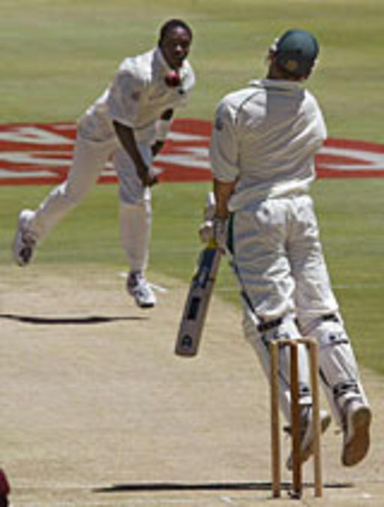 Graeme Smith avoids a Fidel Edwards bouncer on his way to a hundred, South Africa v West Indies, 1st Test, Johannesburg, December 12, 2003
