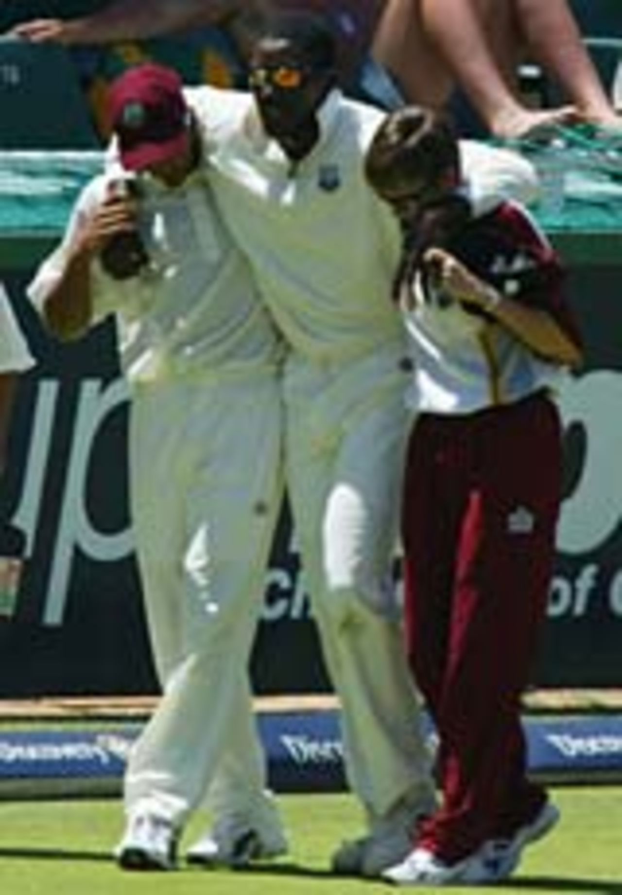 Chris Gayle hobbles from the field with a suspected pulled hamstring, South Africa v West Indies, 1st Test, Johannesburg, December 12, 2003