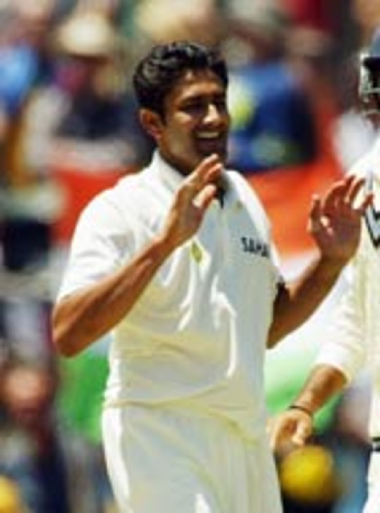 Kumble smiles after taking a wicket, Australia v India, 2nd Test, Adelaide, 2nd day, December 13, 2003