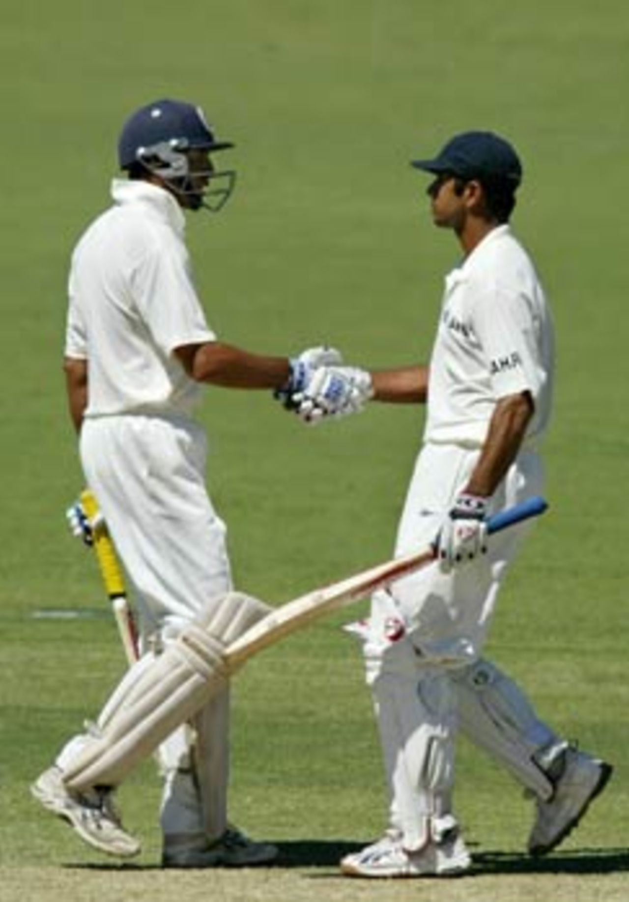 The quiet congratulations tell you how well Laxman and Dravid know each other, Australia v India, 2nd Test, Adelaide, 3rd day, December 14, 2003