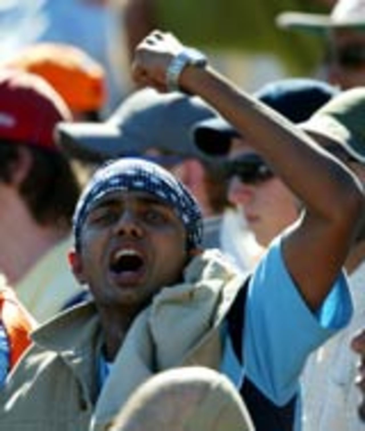 An Indian fan celebrates wildly, Australia v India, 2nd Test, Adelaide, 3rd day, December 14, 2003