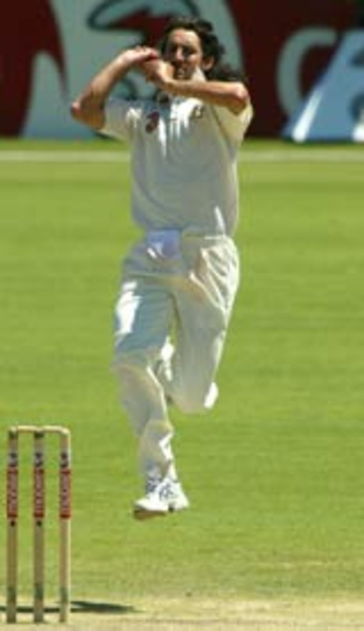 Gillespie charges in to bowl, Australia v India, 2nd Test, Adelaide, 5th day, December 16, 2003