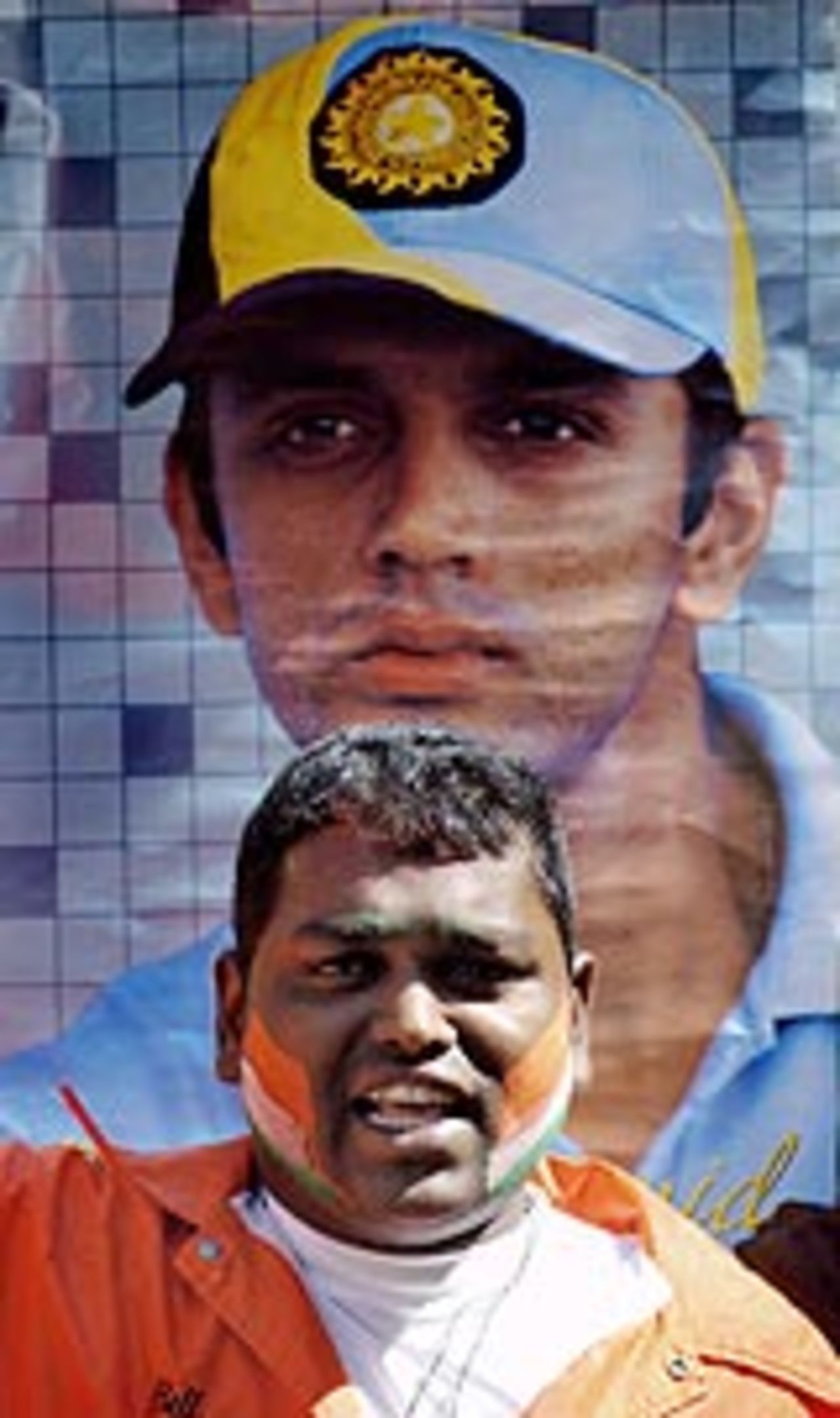 An Indian fan celebrates the historic win at Adelaide in front of a poster of Rahul Dravid, December 17, 2003