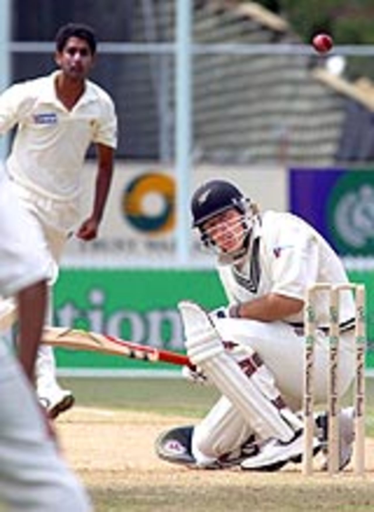 Daniel Vettori ducks as Shabbir Ahmed digs it in, New Zealand v Pakistan, 1st Test, Hamilton, 2nd day, December 20, 2003