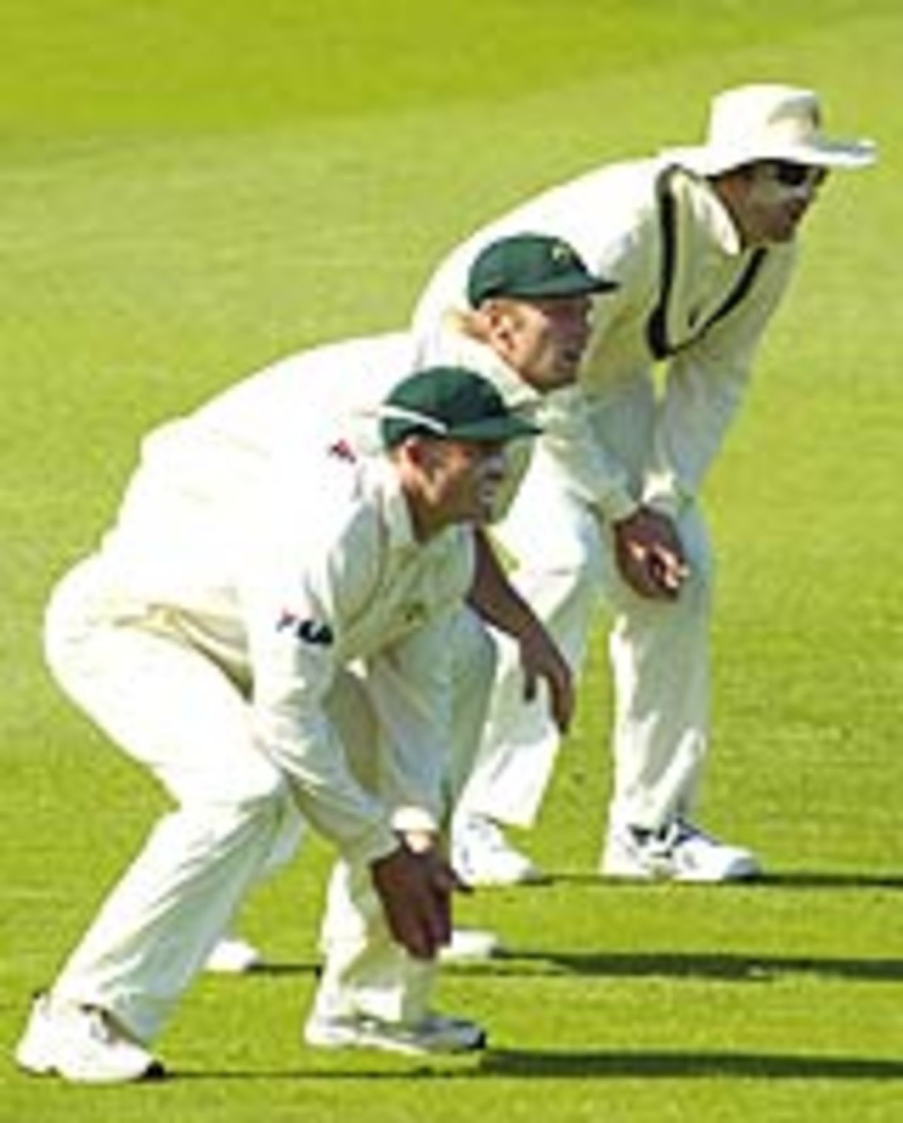 Born slippy. Mike Hussey, Cameron White and Martin Love wait patiently for an edge, Australia A v Indians, tour game, Hobart, 2nd day, December 20, 2003