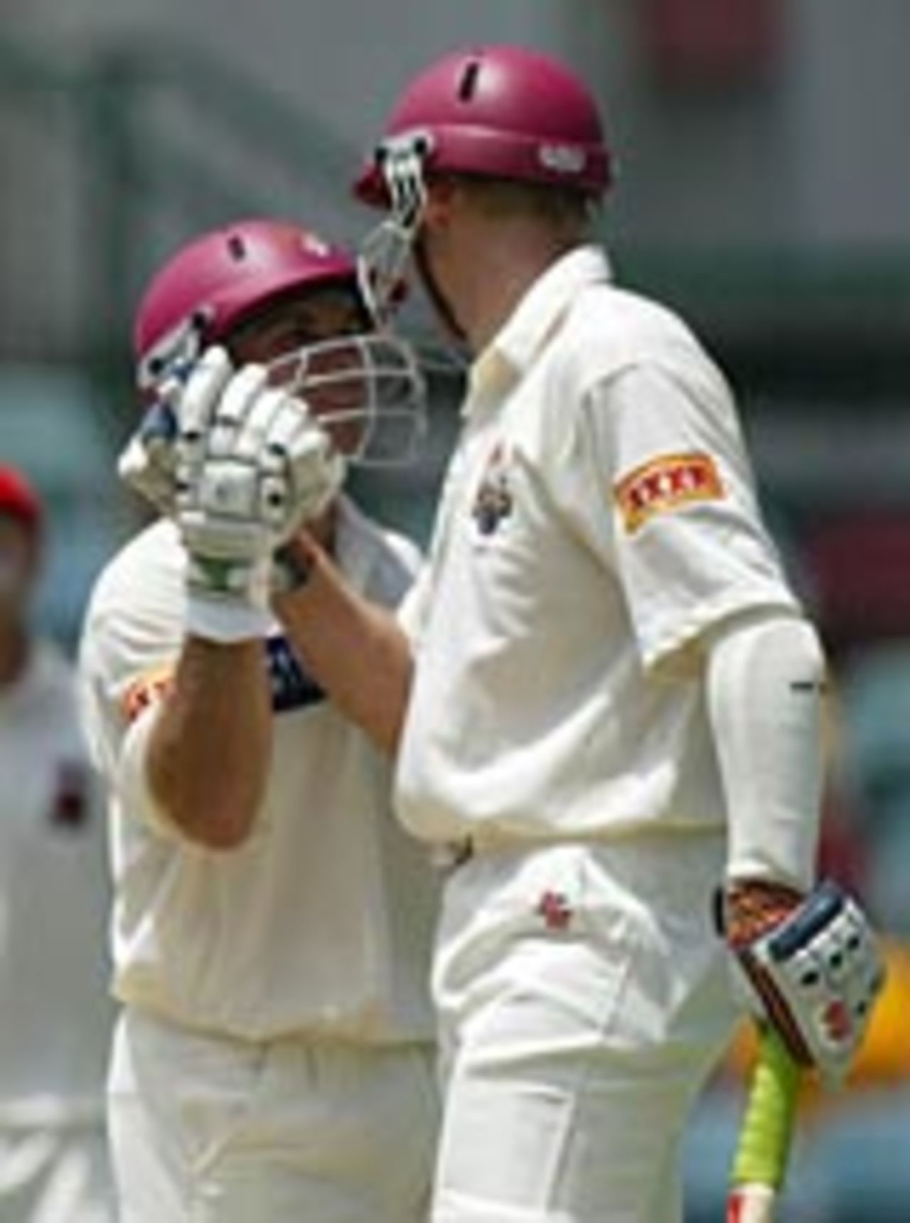 Ashley Noffke and Chris Hartley embrace, Queensland v South Australia, Sydney, December 21, 2003