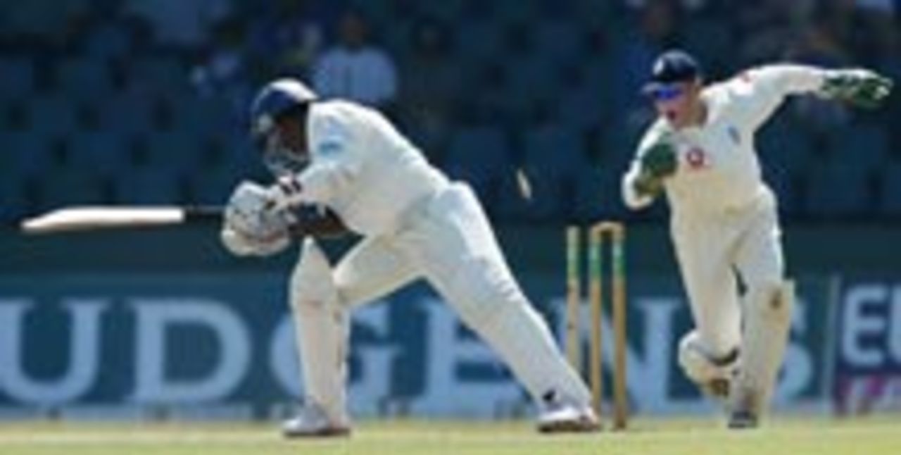 Muralitharan survives a stumping attempt by Chris Read
