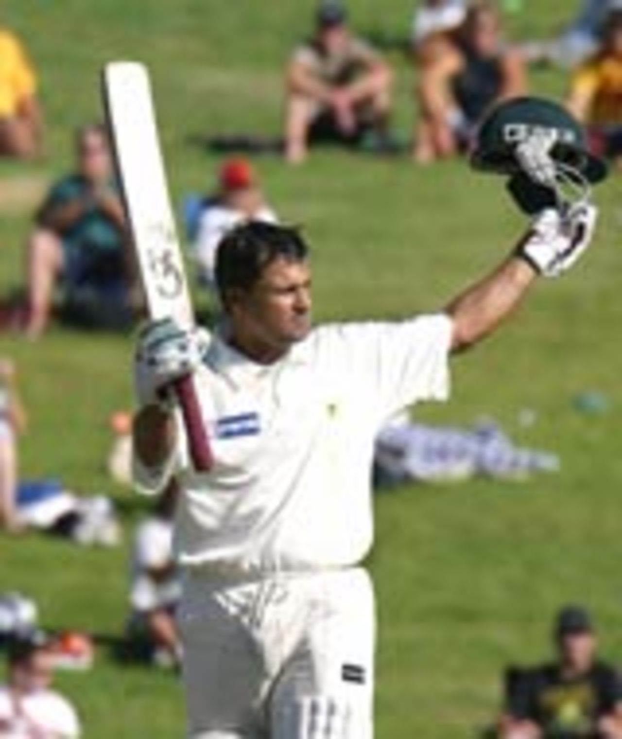 Moin Khan celebrates his century, New Zealand v Pakistan, 1st Test, Hamilton, 4th day, December 22, 2003