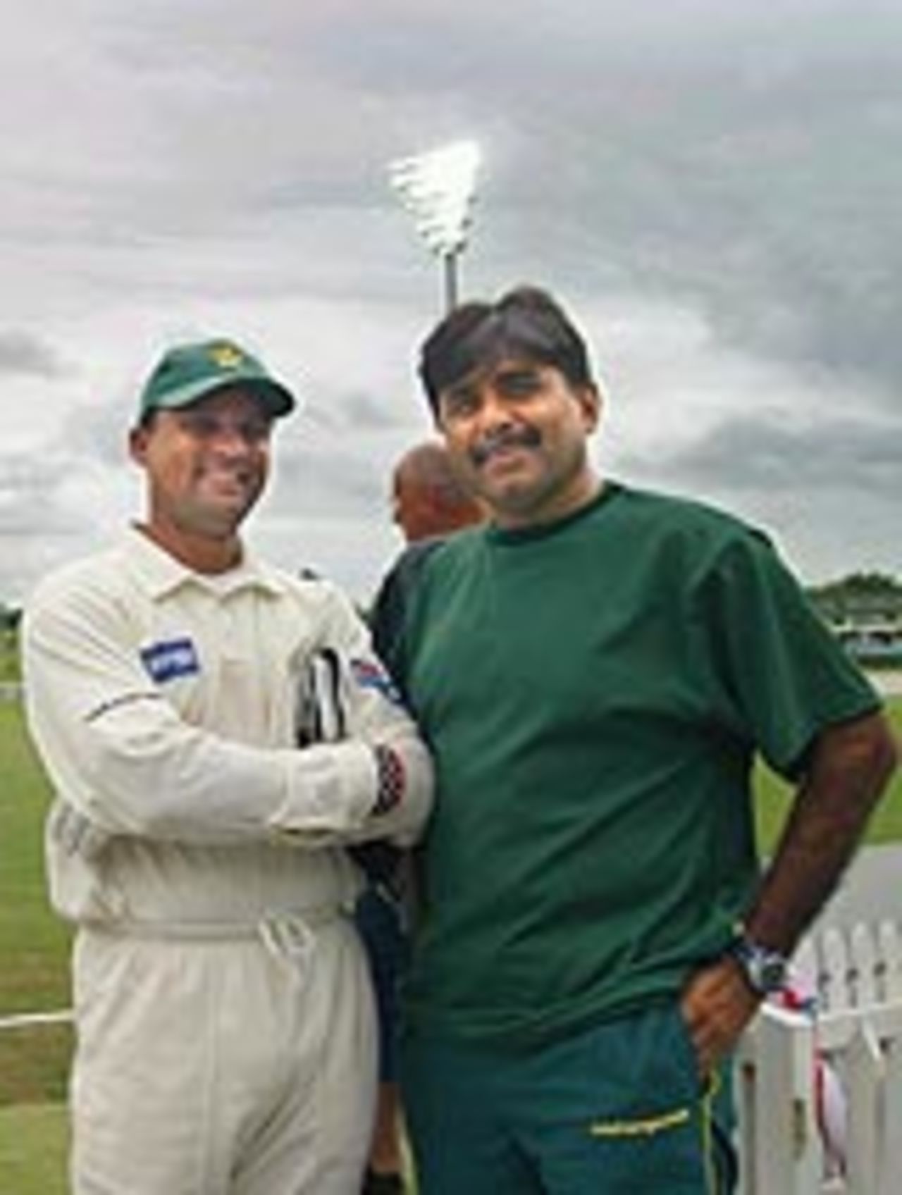 Moin Khan and Javed Miandad, Pakistan's coach, look happy at the way their team is shaping up, New Zealand v Pakistan, 1st Test, Hamilton, 5th day, December 23, 2003