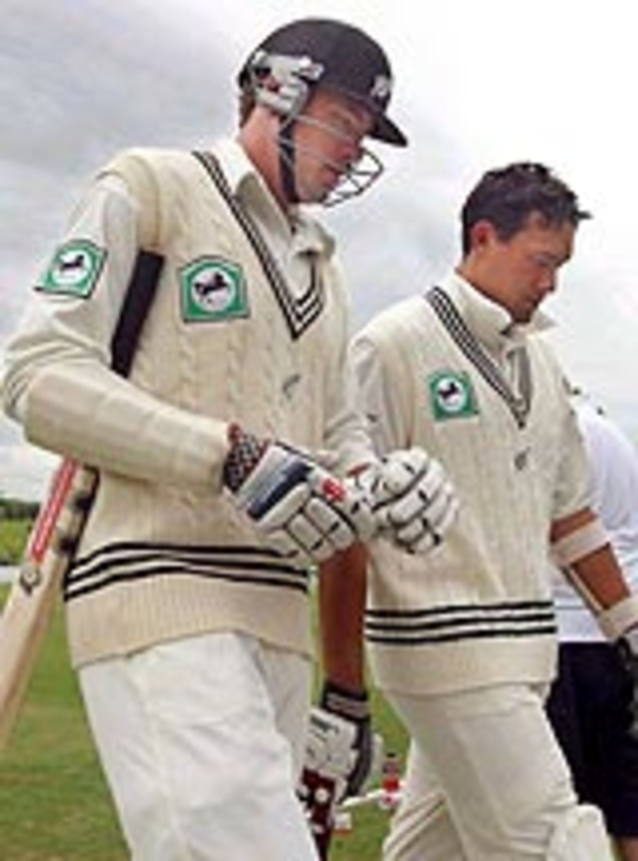 Jacob Oram and Daryl Tuffey walk off the field as the weather comes to New Zealand's rescue, New Zealand v Pakistan, 1st Test, Hamilton, 5th day, December 23, 2003