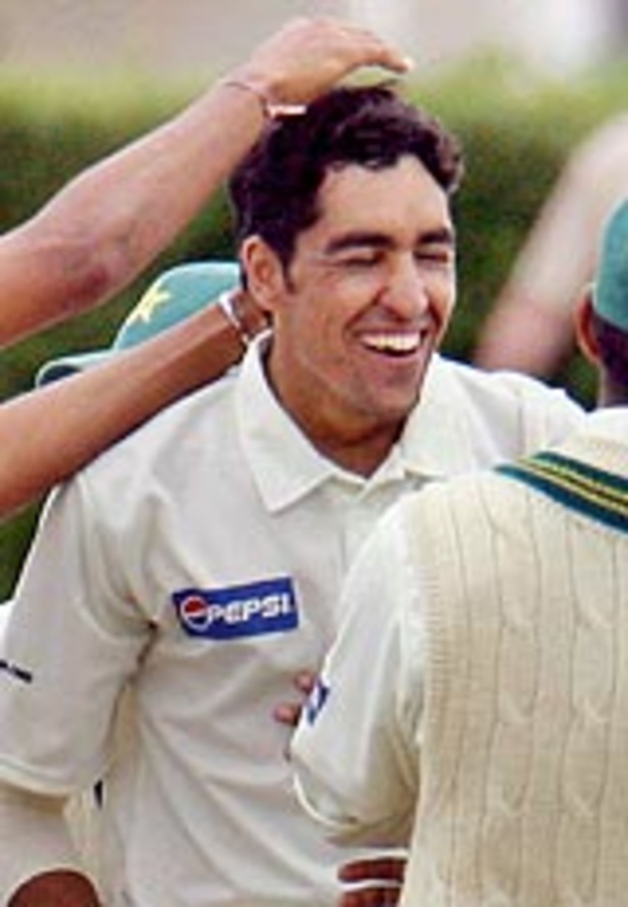 Umar Gul is congratulated after he dismisses Mark Richardson, New Zealand v Pakistan, 1st Test, Hamilton, 5th day, December 23, 2003