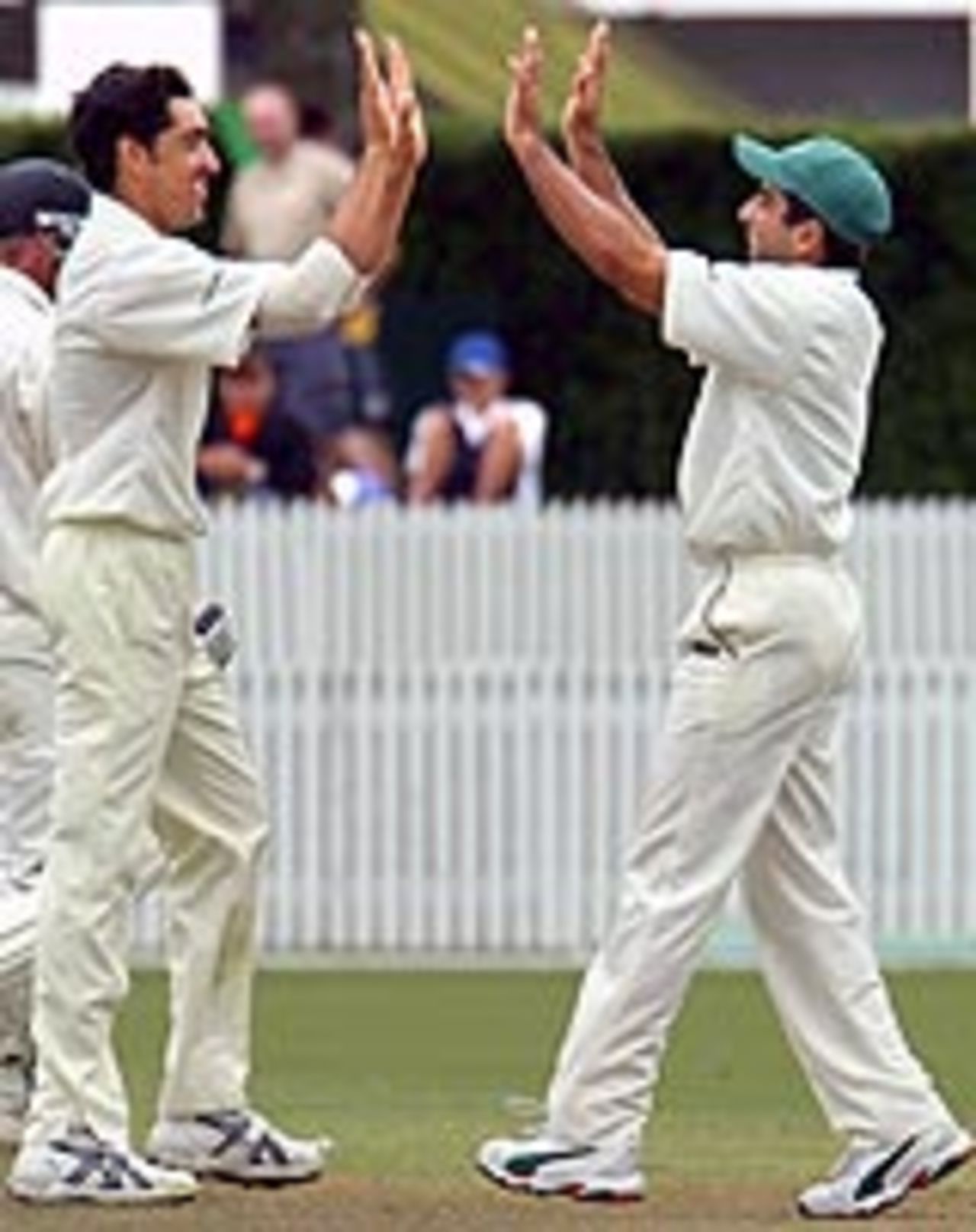 Umar Gul celebrates the wicket of Mark Richardson with Taufeeq Umar, New Zealand v Pakistan, 1st Test, Hamilton, 5th day, December 23, 2003