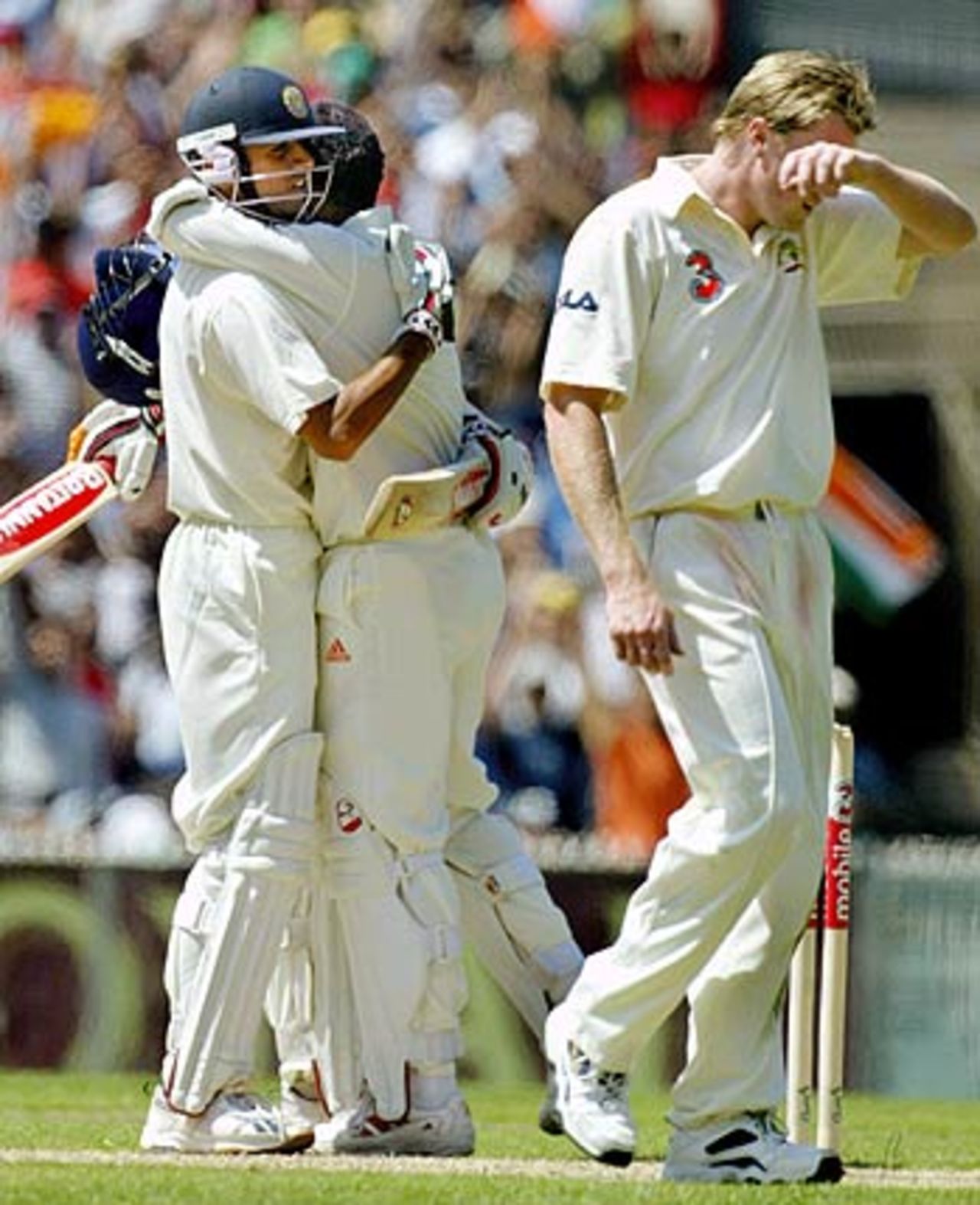 Adelaide's hero congratulates Melbourne's hero. Rahul Dravid was visibly delighted when Virender Sehwag reached his hundred, Australia v India, 3rd Test, Melbourne, 1st day, December 26, 2003