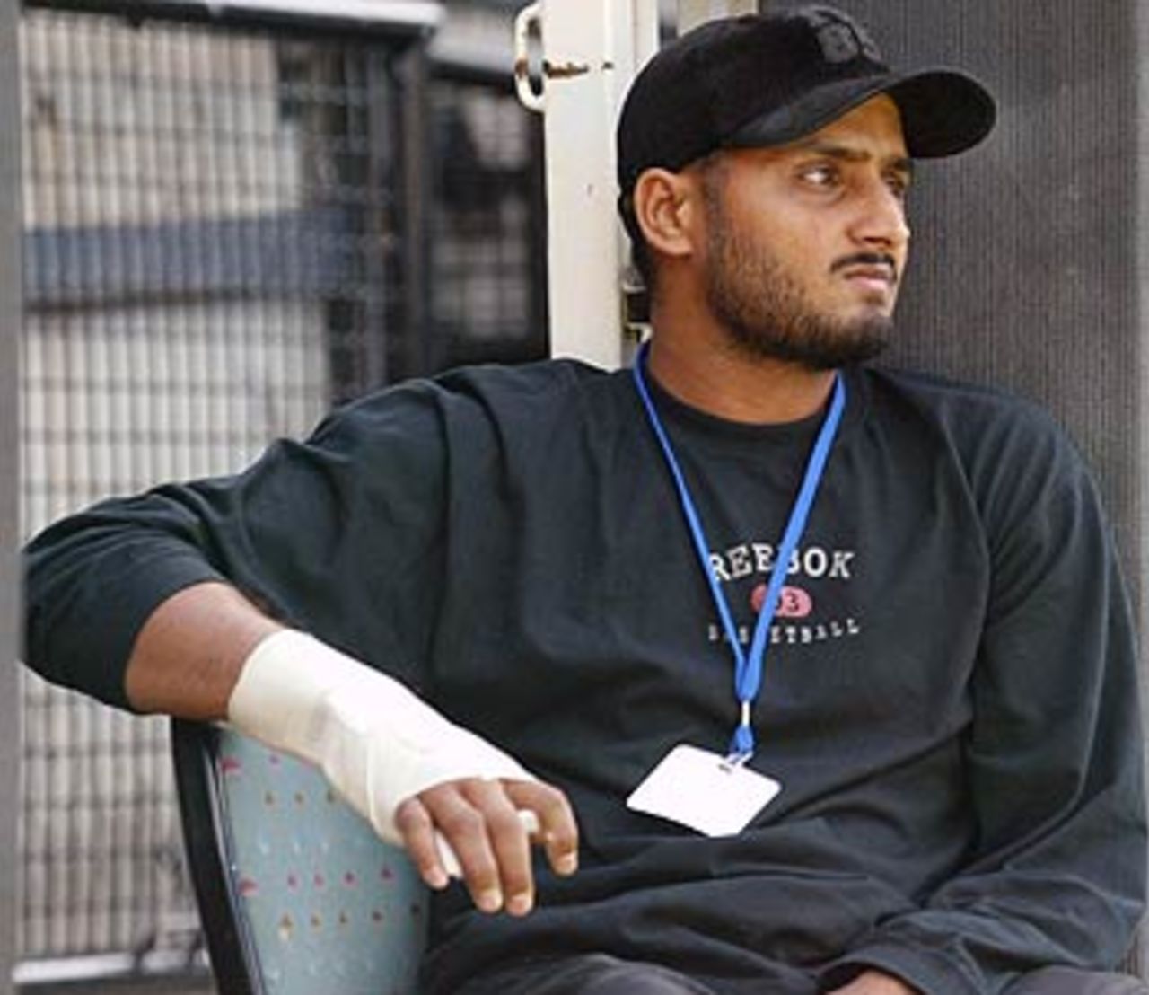 Out of action, but in the loop. Harbhajan Singh, whose hand was recently operated upon, watches his colleagues take the upper hand, Australia v India, 3rd Test, Melbourne, 1st day, December 26, 2003