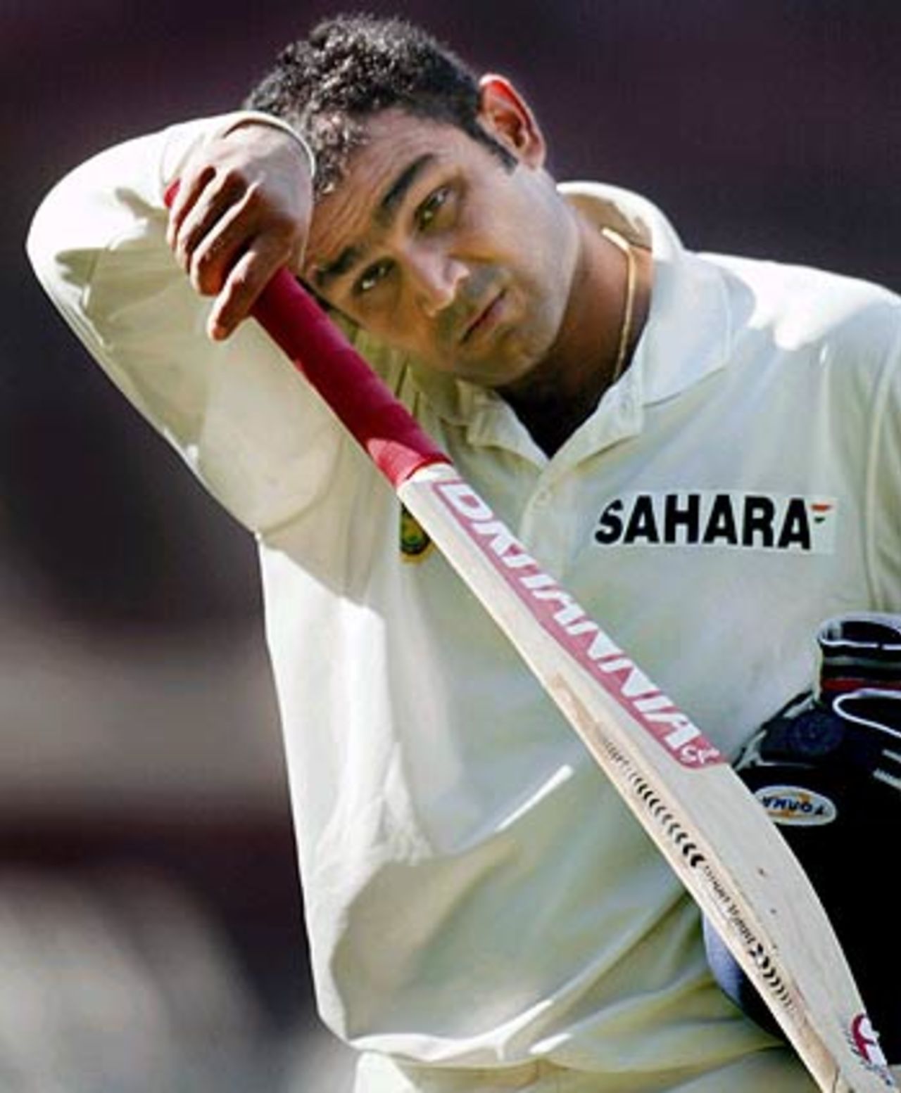 All in a day's work. Virender Sehwag departs after his blistering innings of 195, Australia v India, 3rd Test, Melbourne, 1st day, December 26, 2003