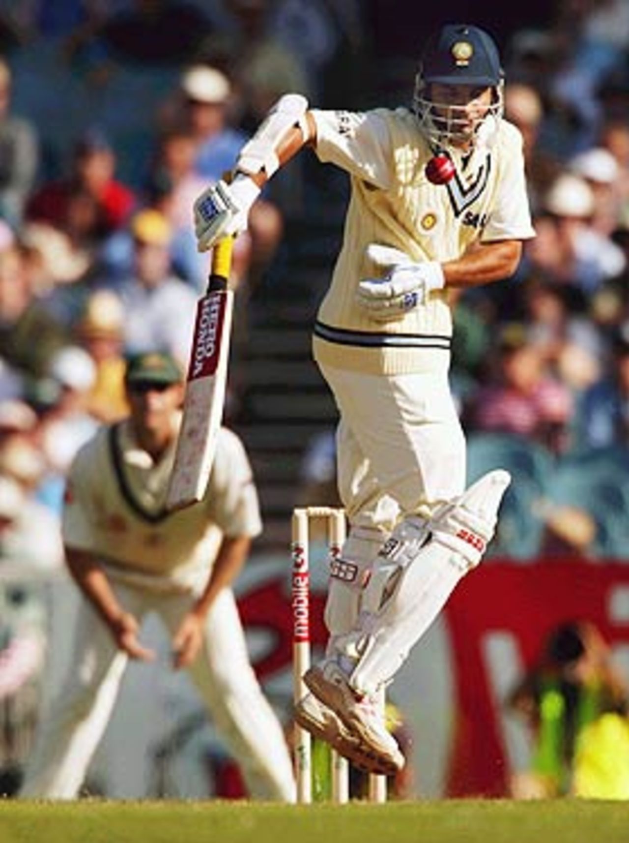 Sourav Ganguly is made to hop, as he fends off a snorter from Brett Lee, Australia v India, 3rd Test, Melbourne, 1st day, December 26, 2003