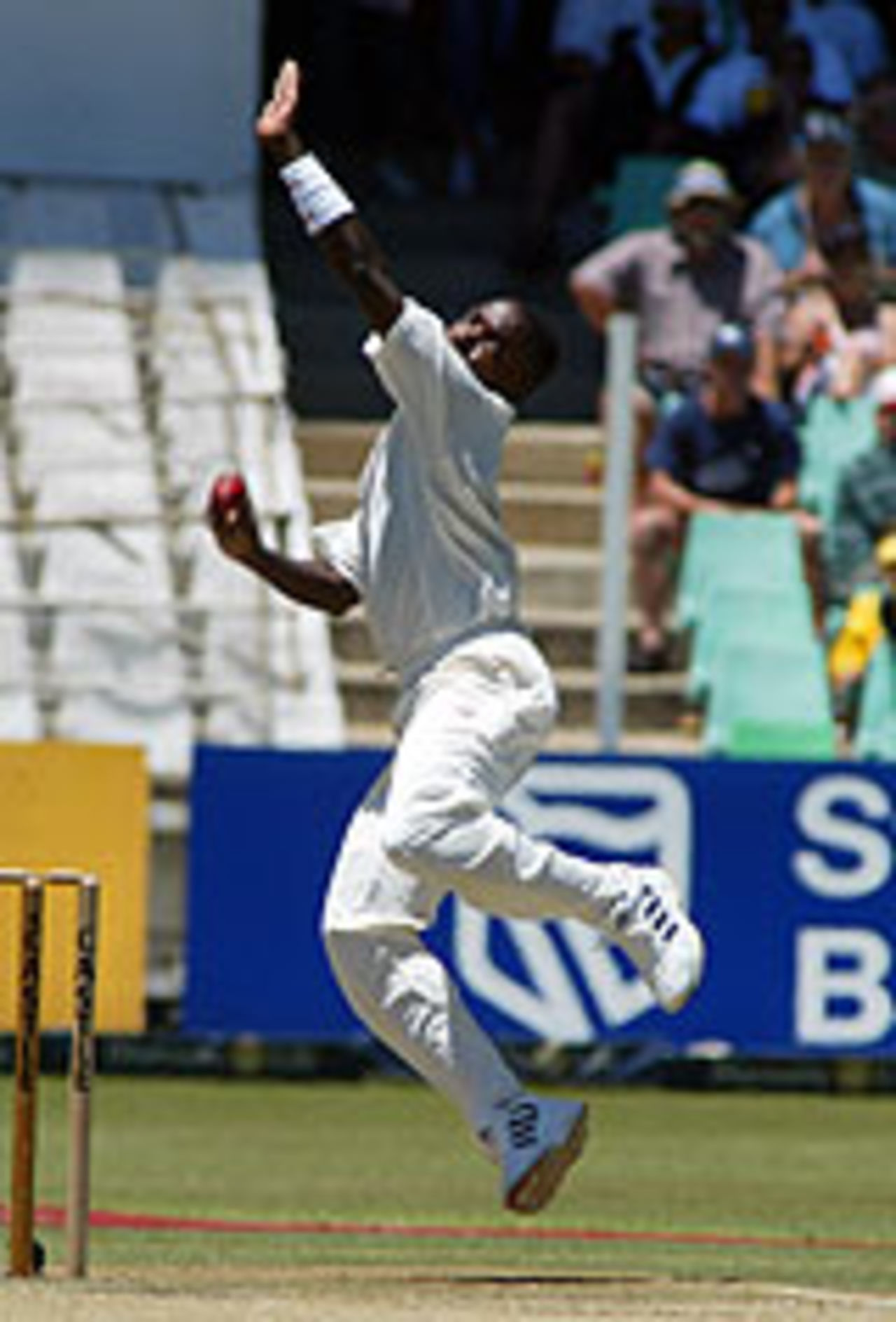 Fidel Edwards bounds in to bowl at Kingsmead, South Africa v West Indies, December 27, 2003