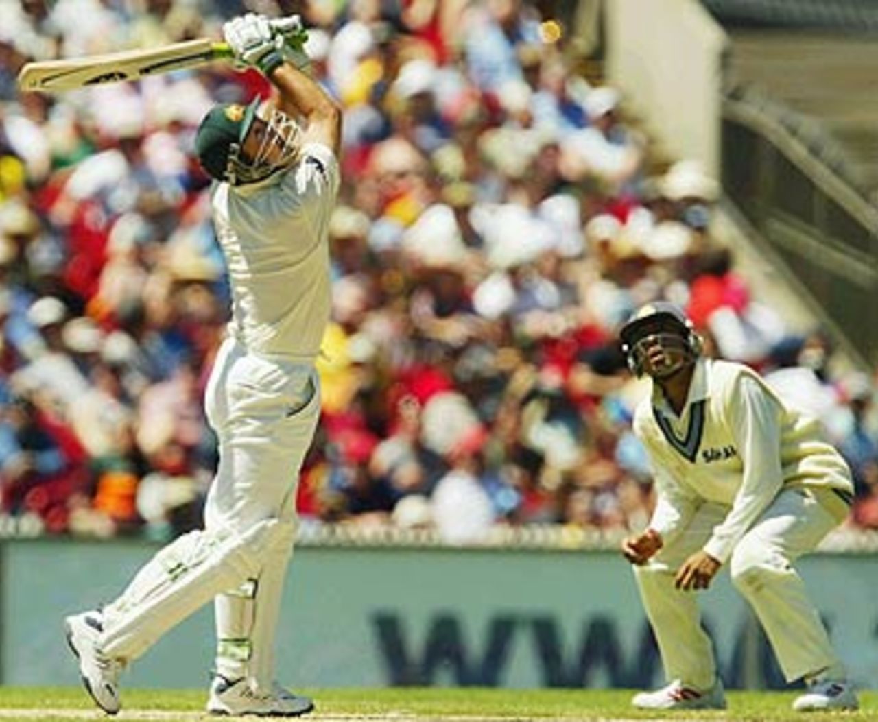 Look Akash, a bird. Ricky Ponting skies a ball as Akash Chopra looks on, 3rd Test, Melbourne, 2nd day, December 27, 2003