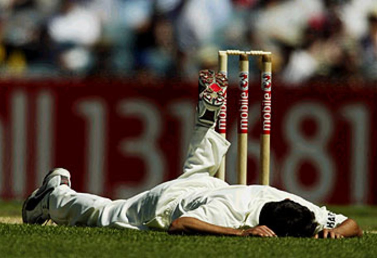 The story of the day for India. Ajit Agarkar lies on the ground, 3rd Test, Melbourne, 2nd day, December 27, 2003