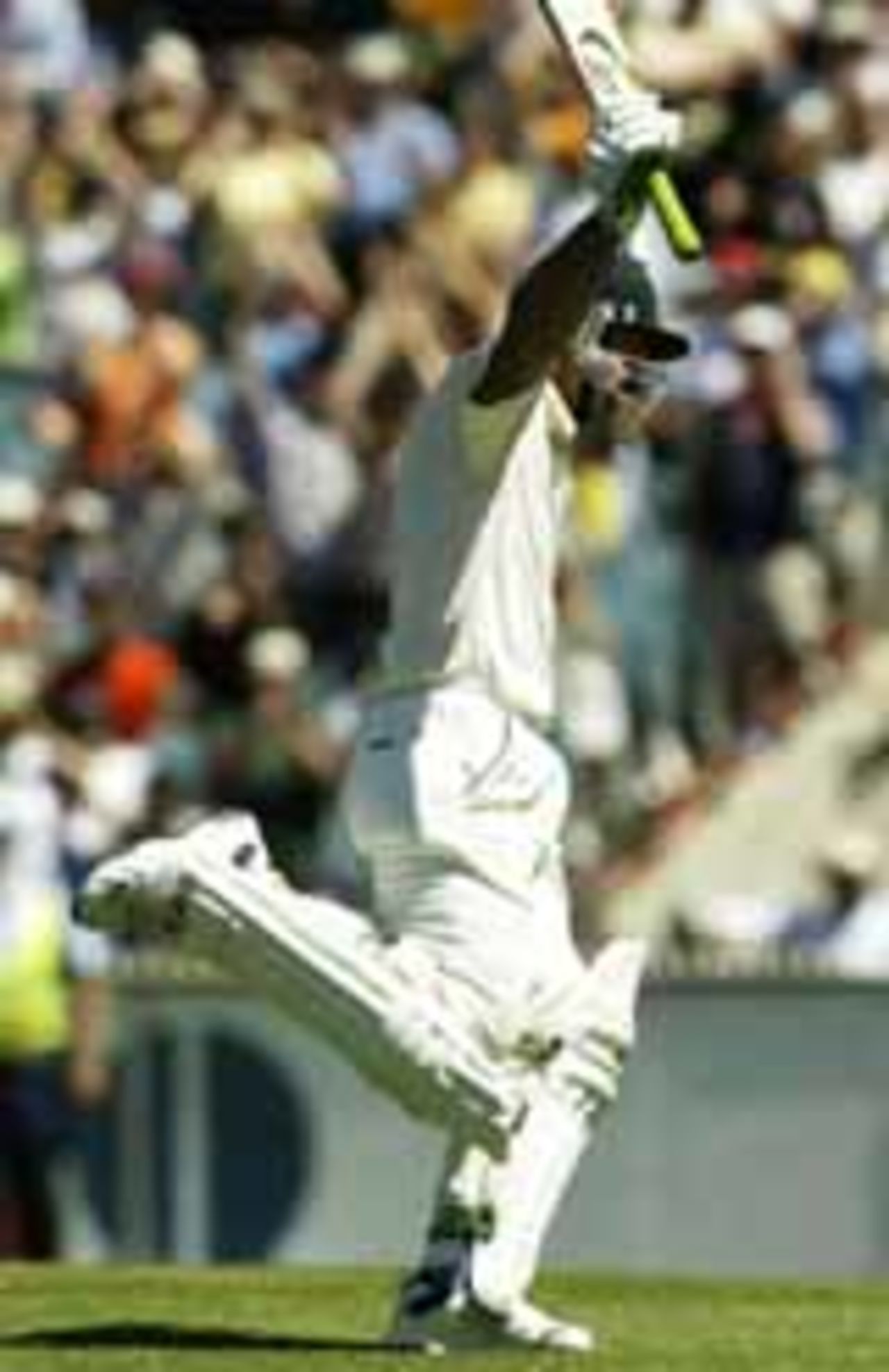 Ricky Ponting runs on after achieving the double-century, 3rd Test, Melbourne, 3rd day, December 28, 2003