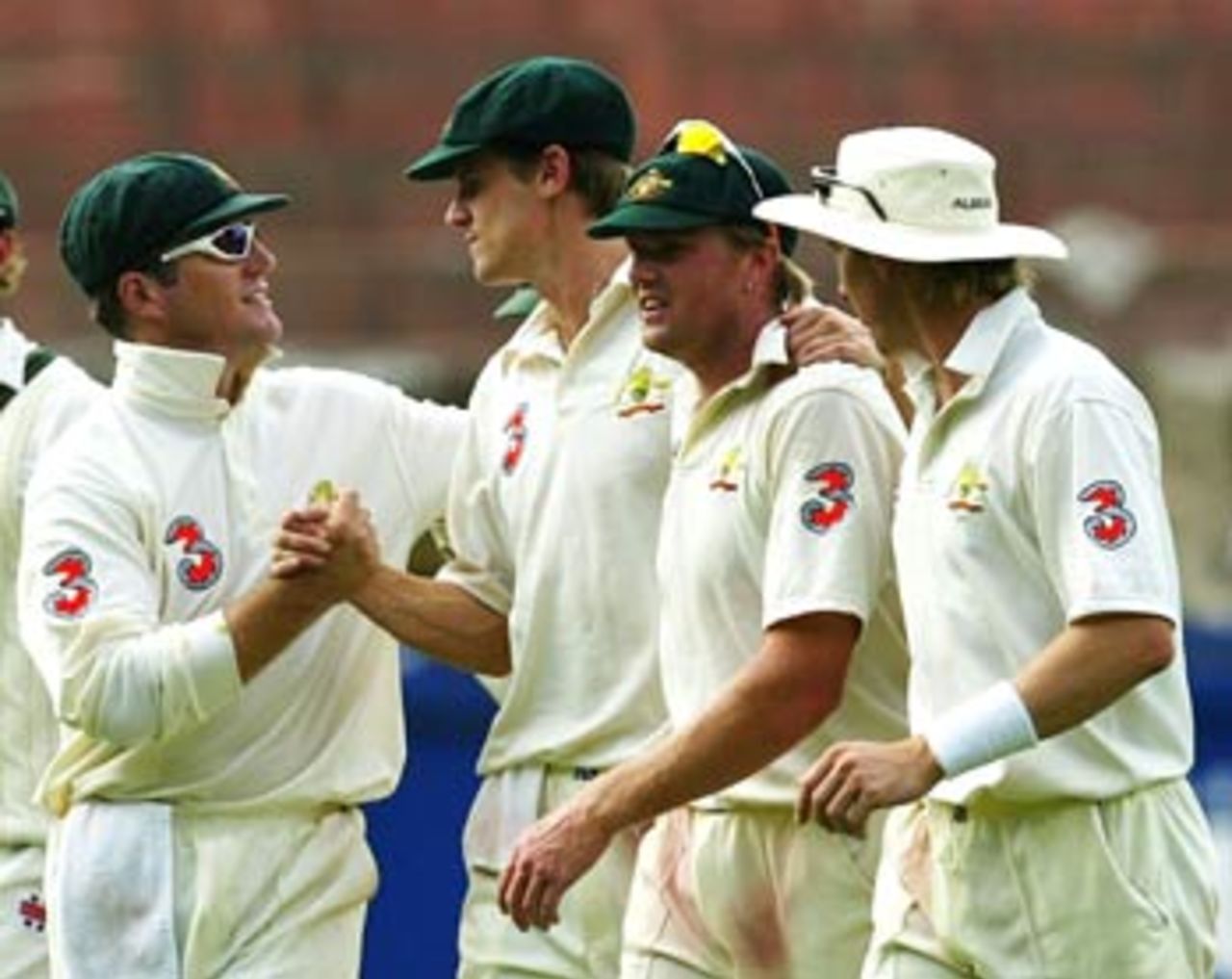 Australia's bowlers patted themselves on the back for a job well done, Australia v India, 3rd Test, Melbourne, 4th day, December 29, 2003