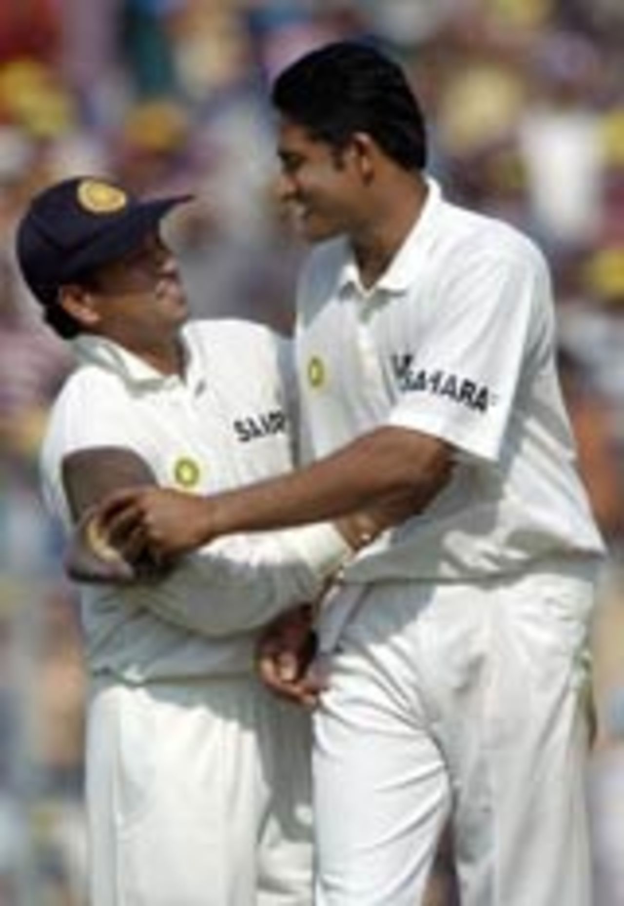 Sachin Tendulkar hugs Anil Kumble, India v South Africa, fifth day, second Test, Kolkata, December 2 2004