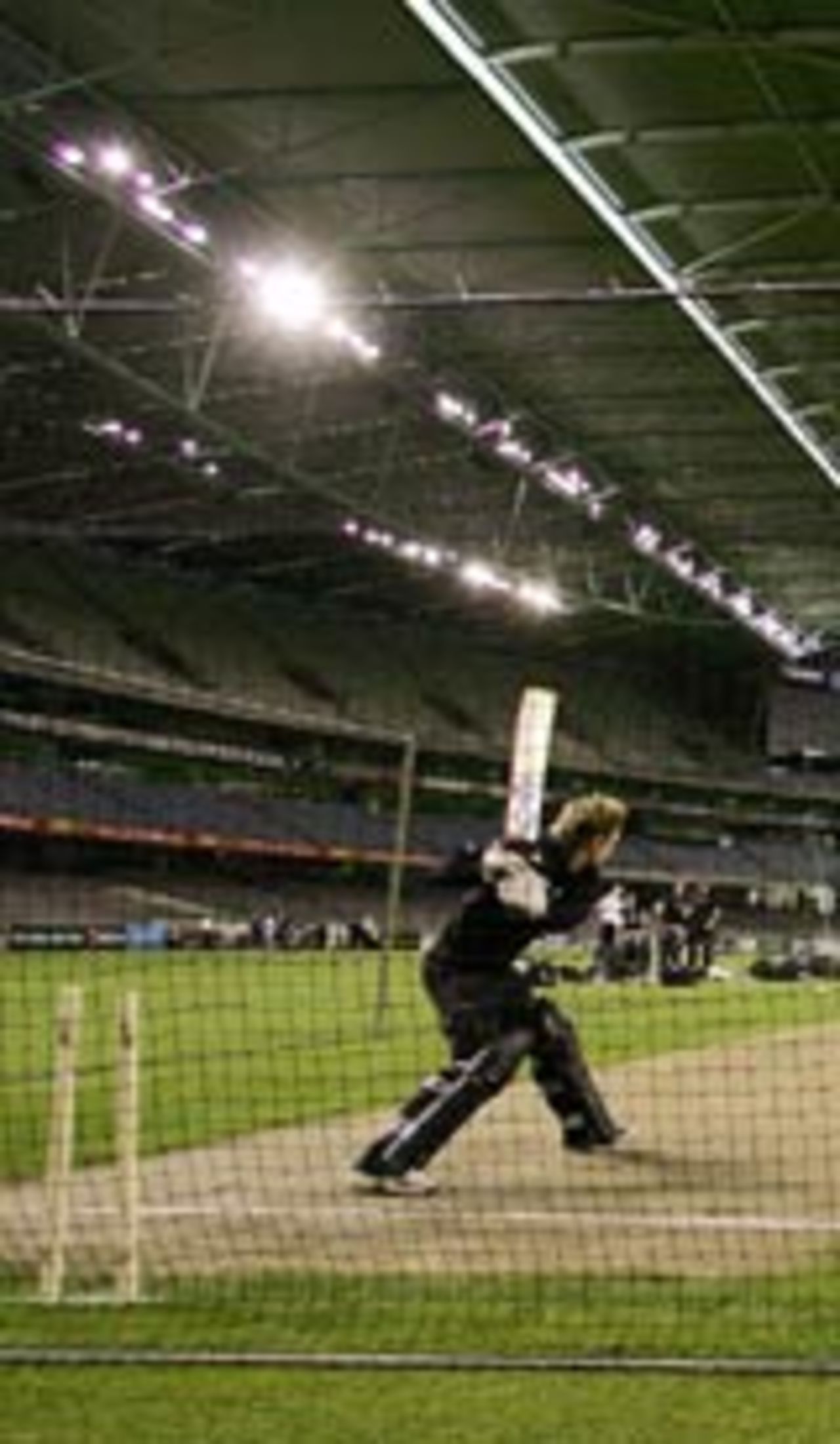 A New Zealand batsman has a hit in the nets under lights ahead of the Chappell-Hadlee series, Melbourne, December 3 2004