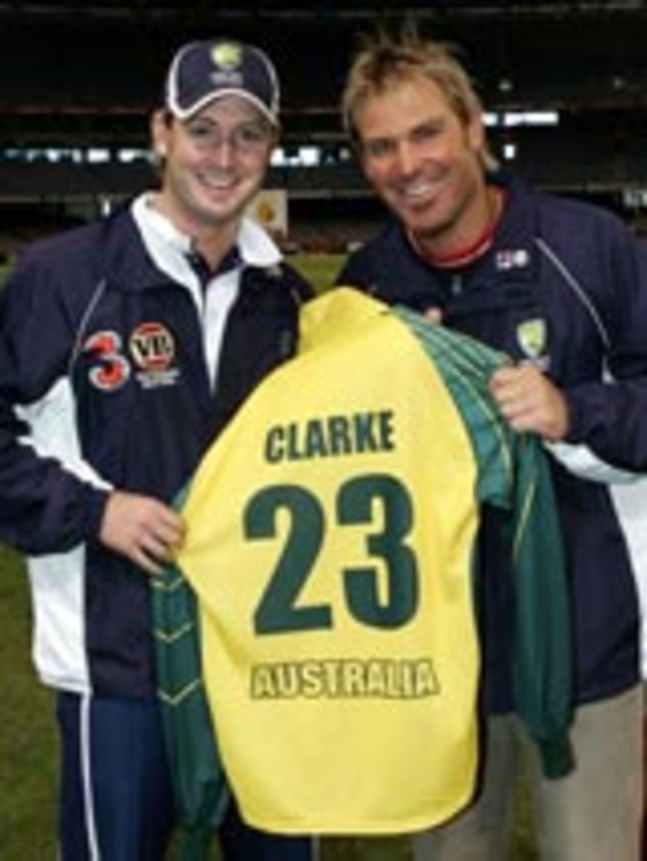 Shane Warne hands over the No. 23 shirt to Michael Clarke, December 4, 2004