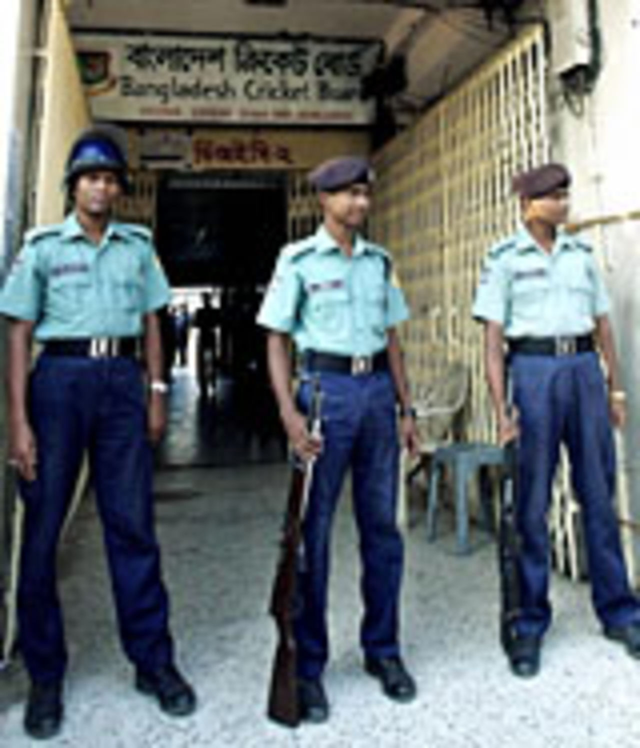 Police outside the Bangabandhu National Stadium in Dhaka, home of the Bangladesh cricket board, December 6 2004