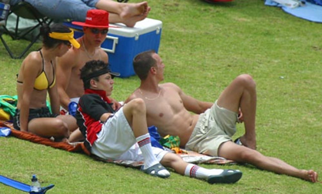 Spectators relax, Dolphins v Warriors, Pietermaritzburg, Standard Bank Cup, December 5 2004