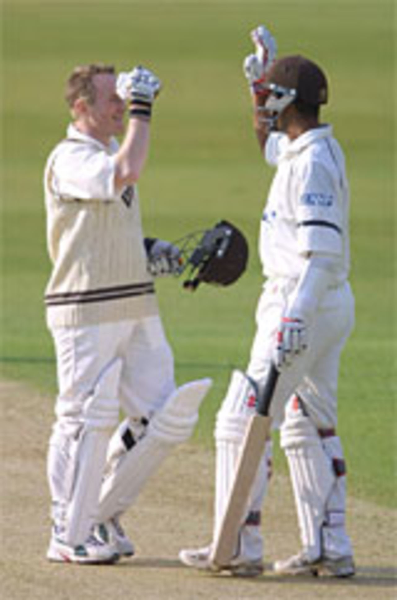 Nadeem Shahid and Ali Brown celebrate