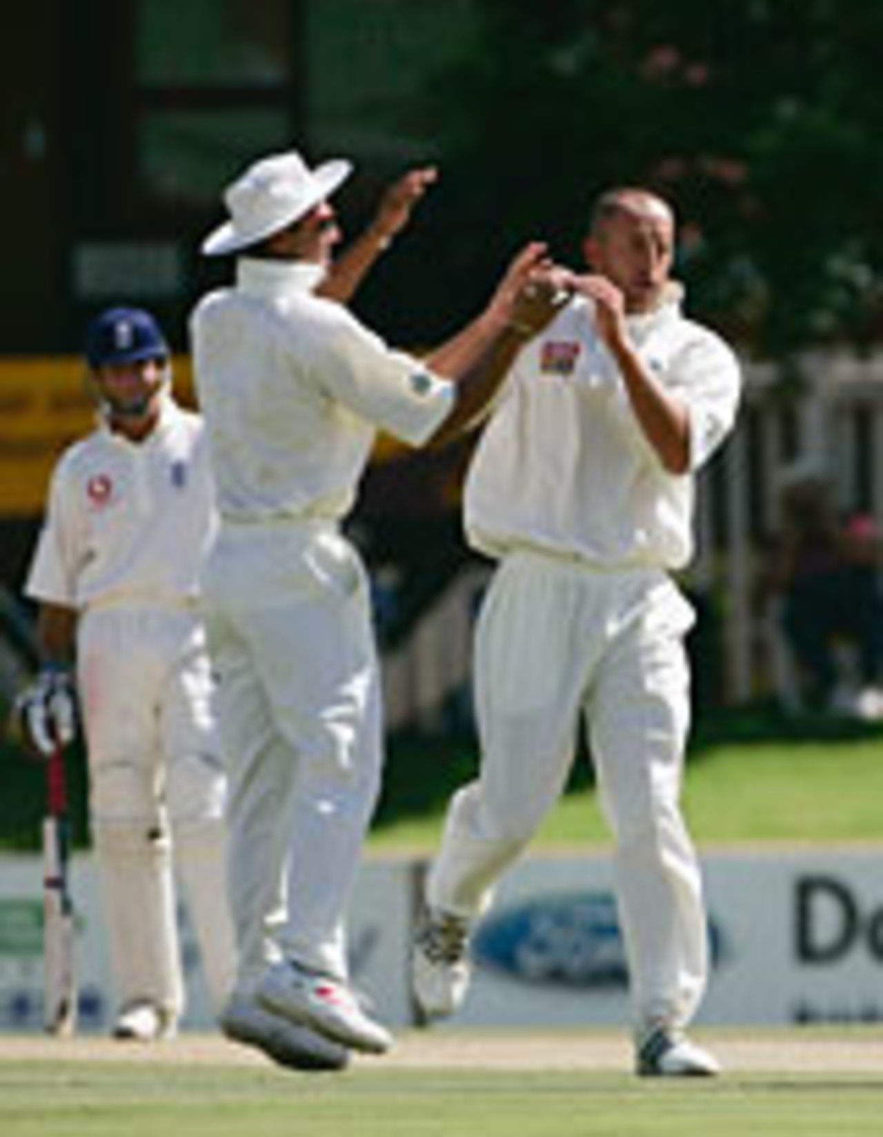Charl Willoughby congratulated by team-mates for another wicket before tea, South Africa A v England XI, second day, Potchefstroom, December 12 2004