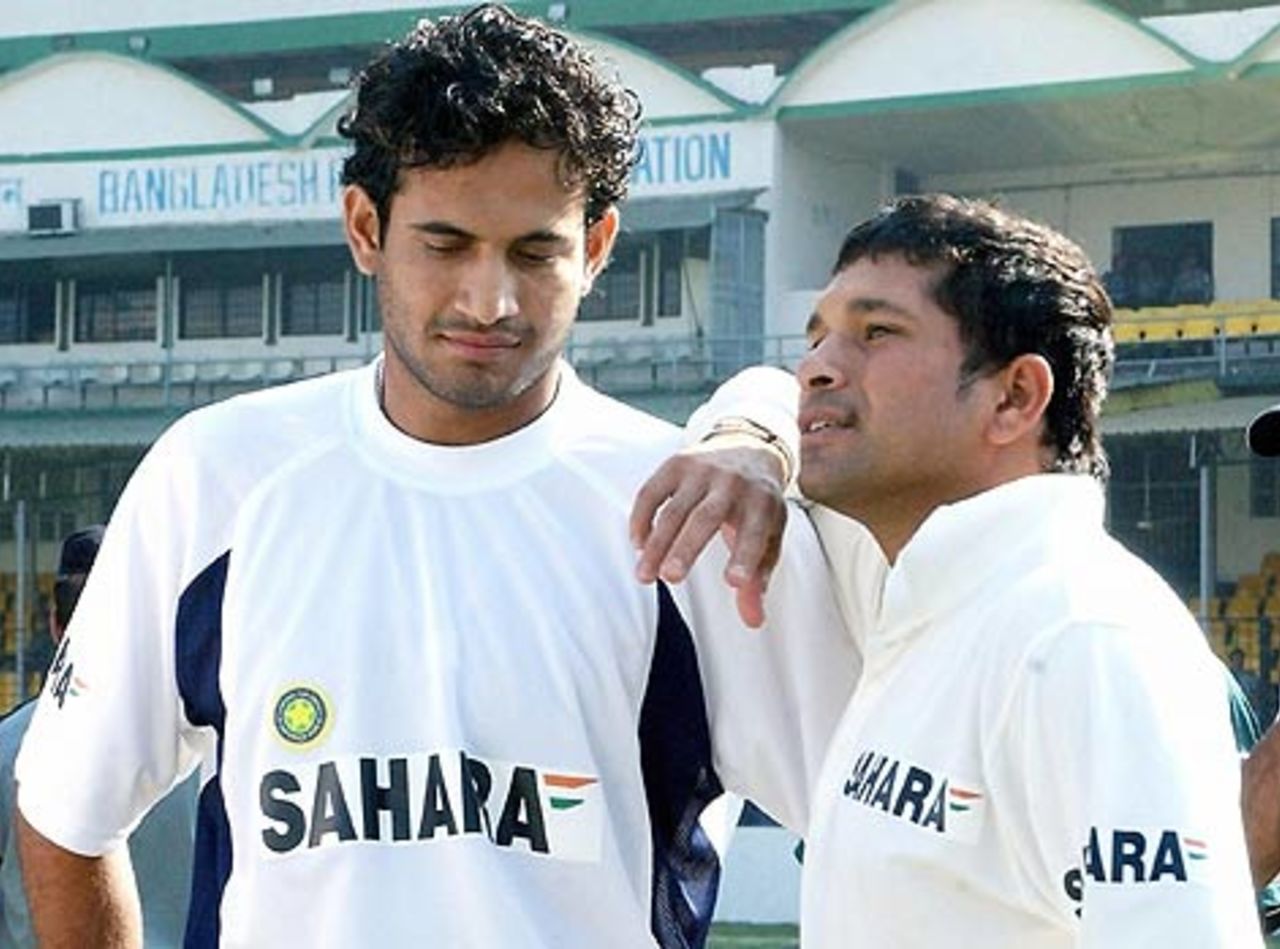 Sachin Tendulkar and Irfan Pathan share a moment after the innings victory, Bangladesh v India, Dhaka, December 13, 2004