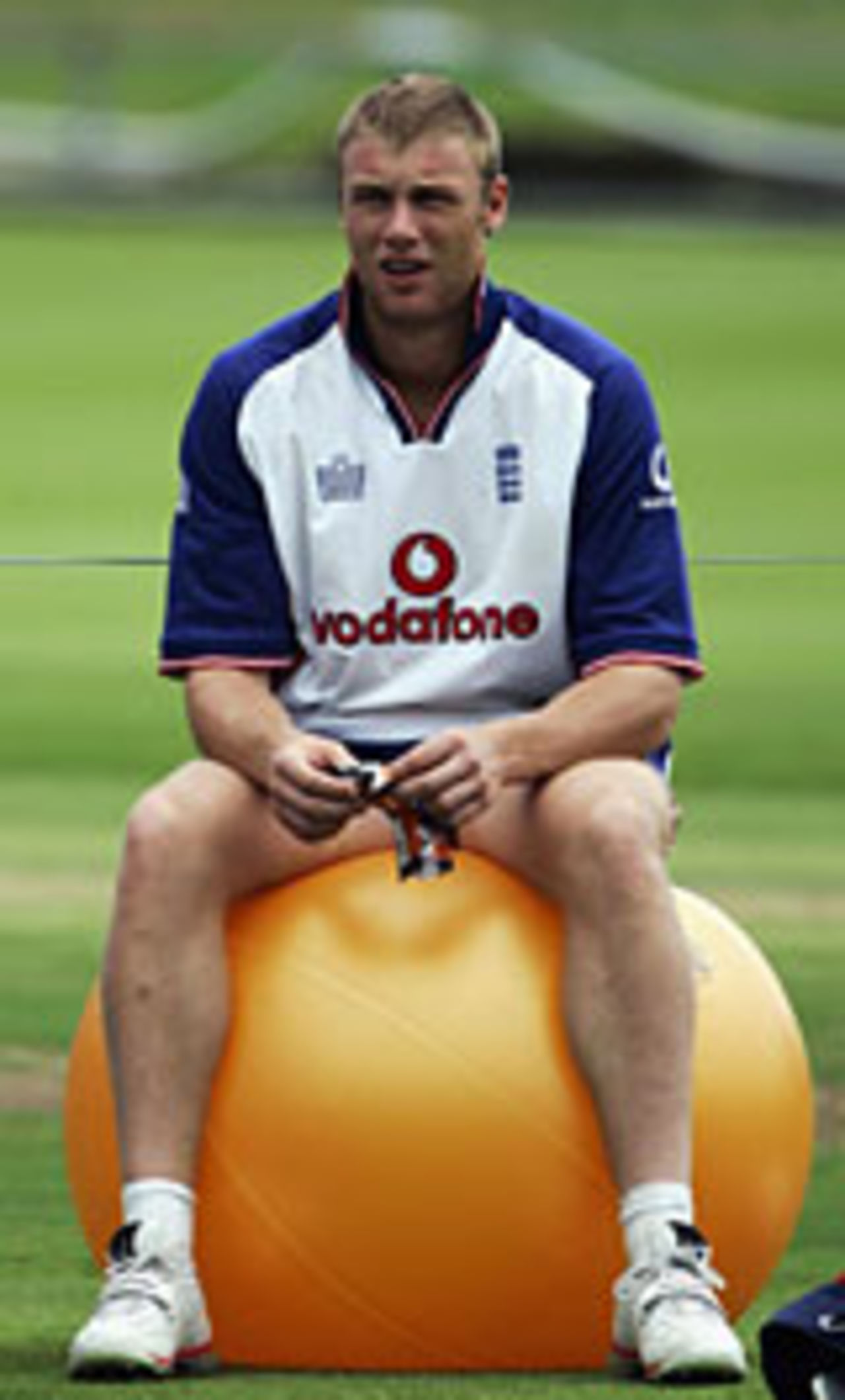 Andrew Flintoff sitting on a ball during an England training session, December 15 2004